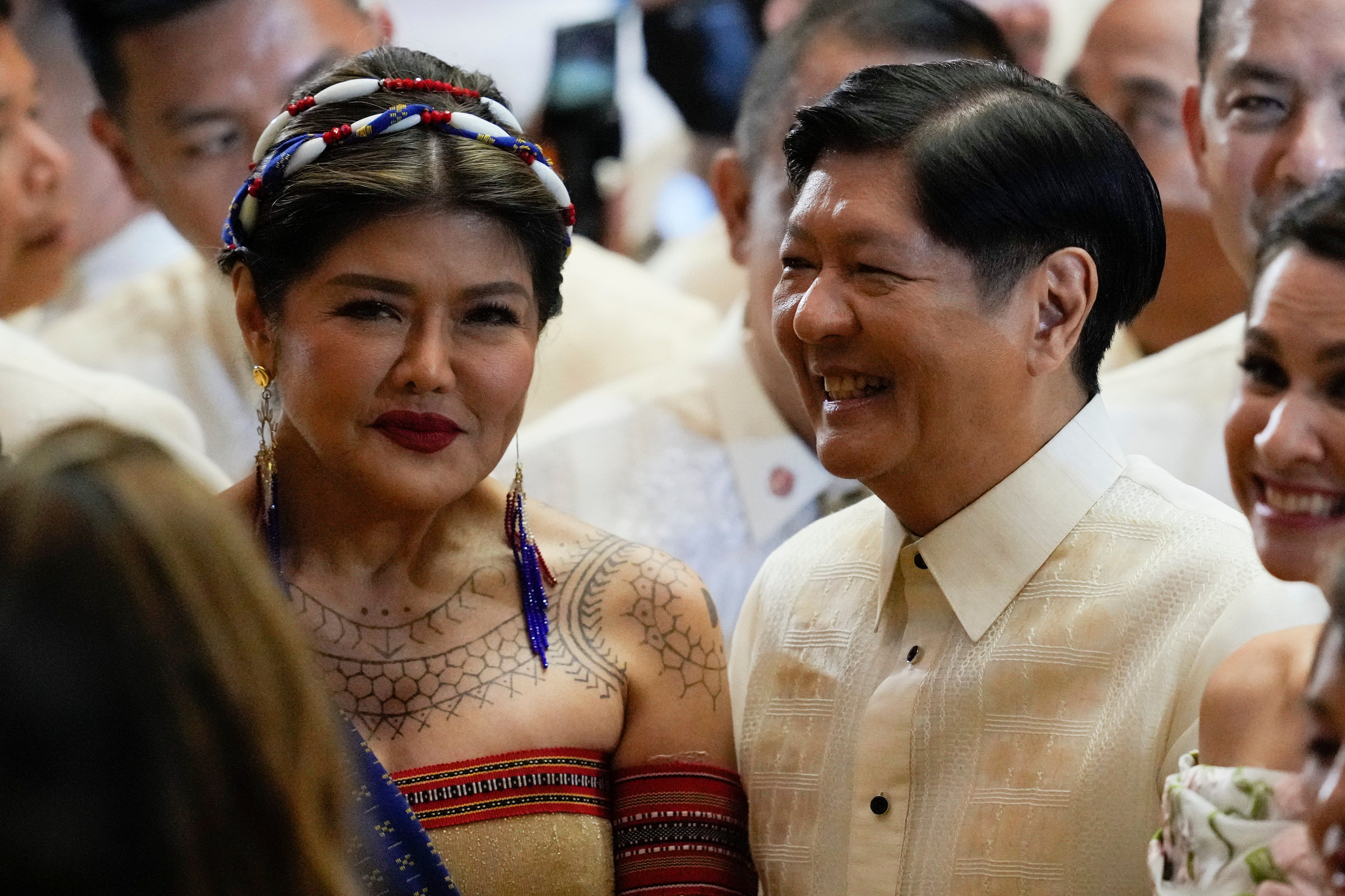 Philippine President Ferdinand Marcos Jnr, right, stands beside his sister Senator Imee Marcos after he delivers his second state of the nation address at the House of Representatives in Quezon City, Philippines on July 24, 2023. Photo: AP