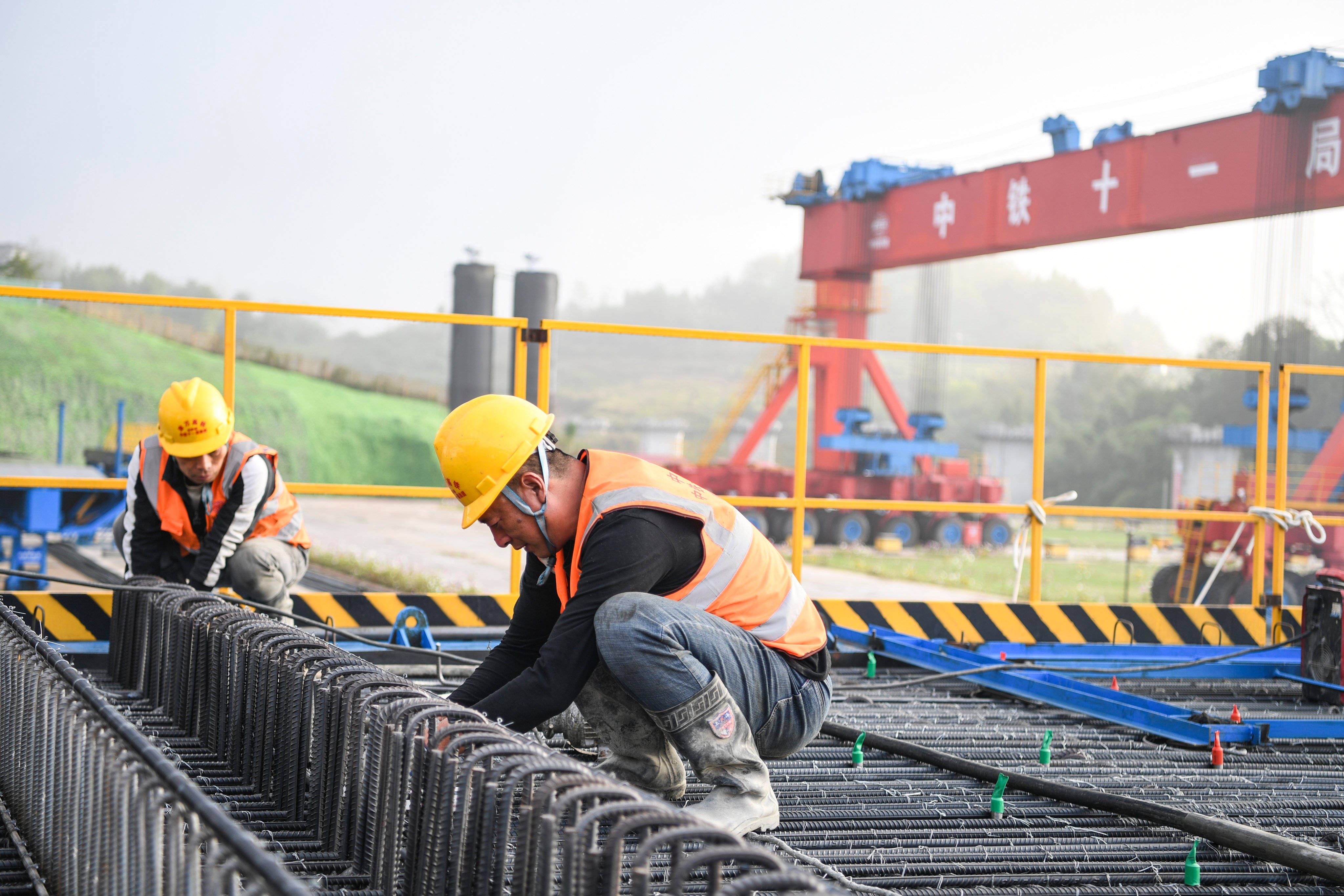 Construction workers in Xiangshui town in the Wanzhou District of Chongqing, southwest China. Photo: Xinhua