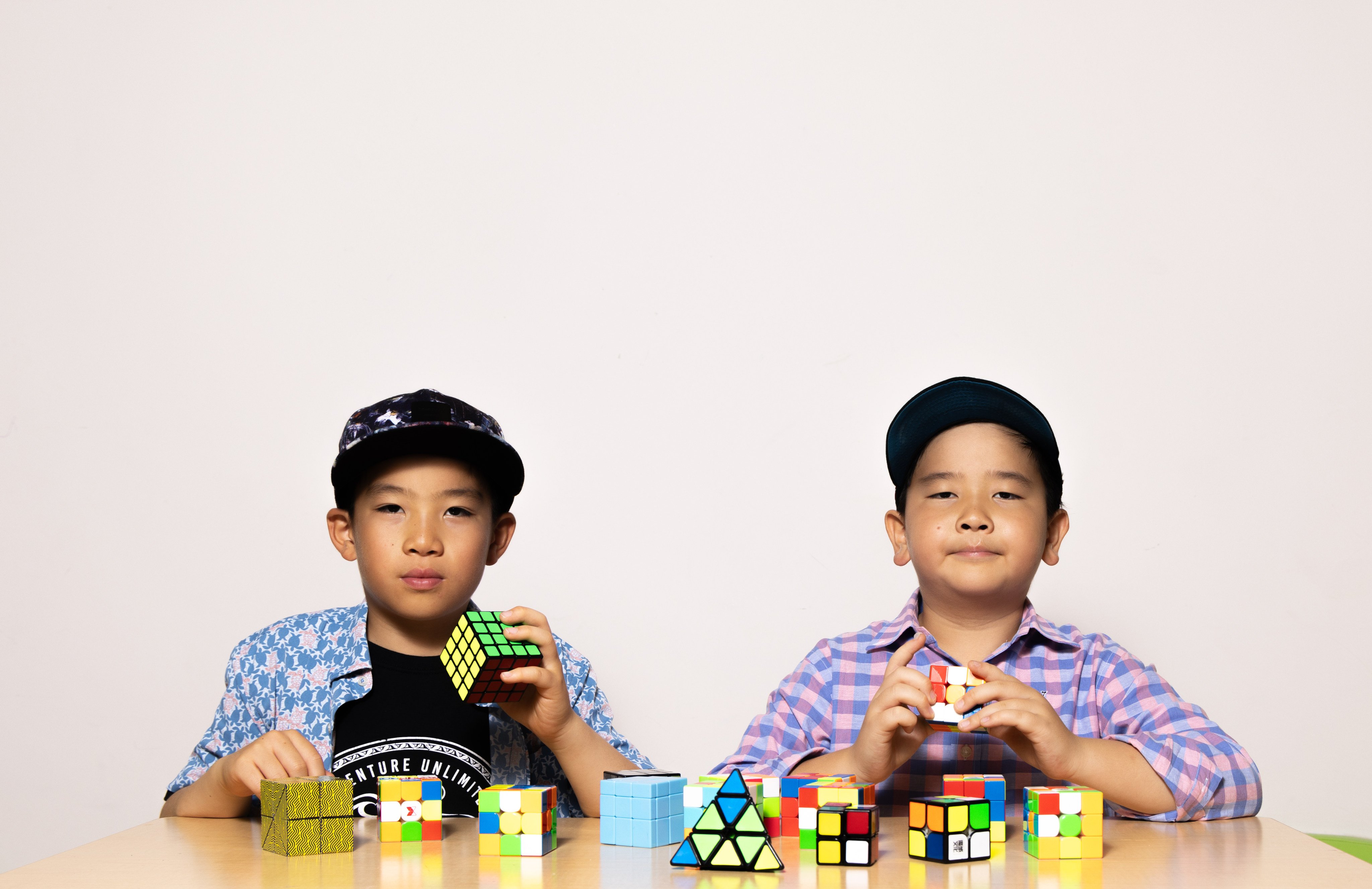 Alexander Choi (right) and Roman Choi (left) with their Rubik’s cubes. Photo: Jocelyn Tam