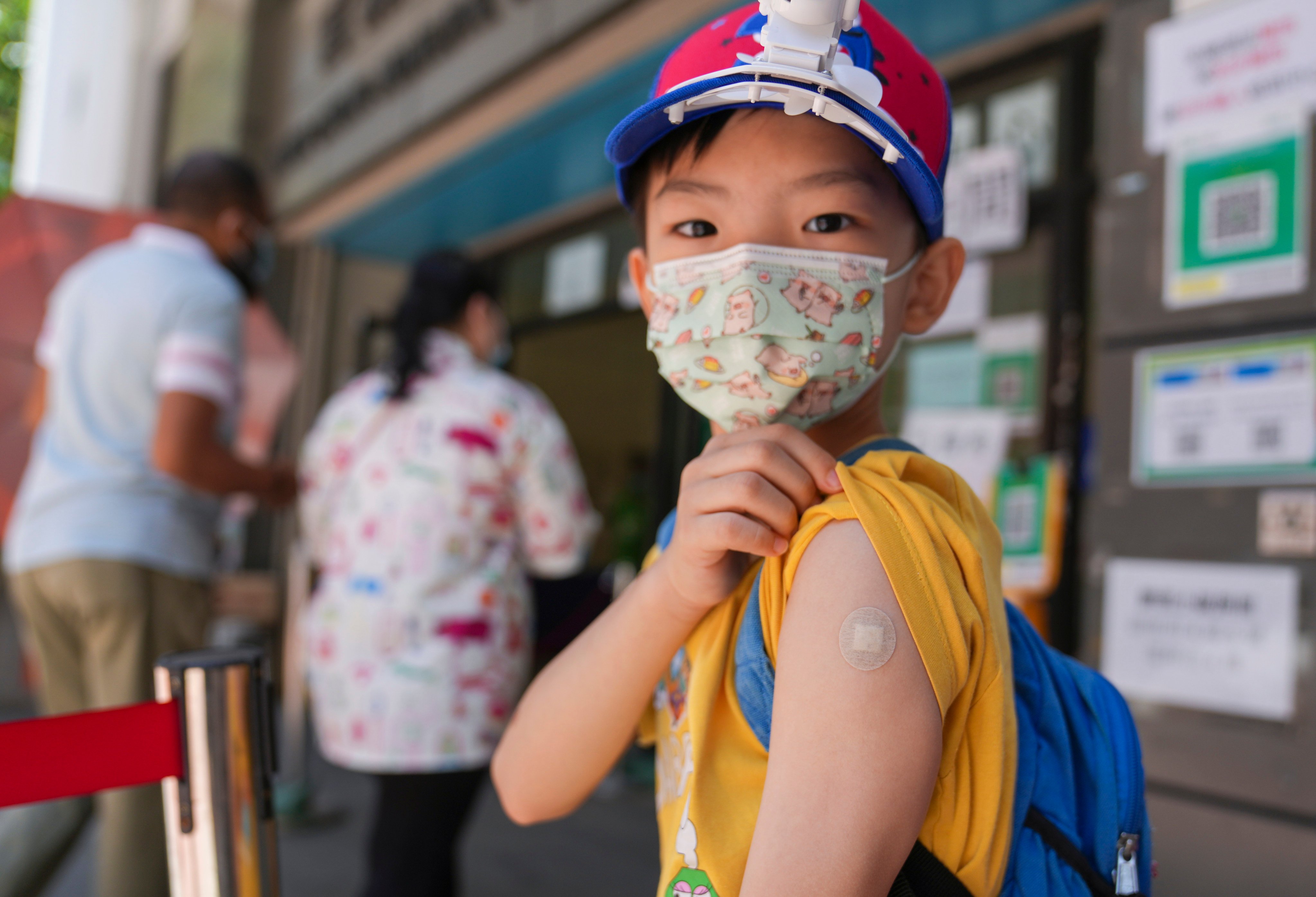 Experts have also urged children to get vaccinated against the coronavirus in the light of a recent severe case. Photo: Sam Tsang 