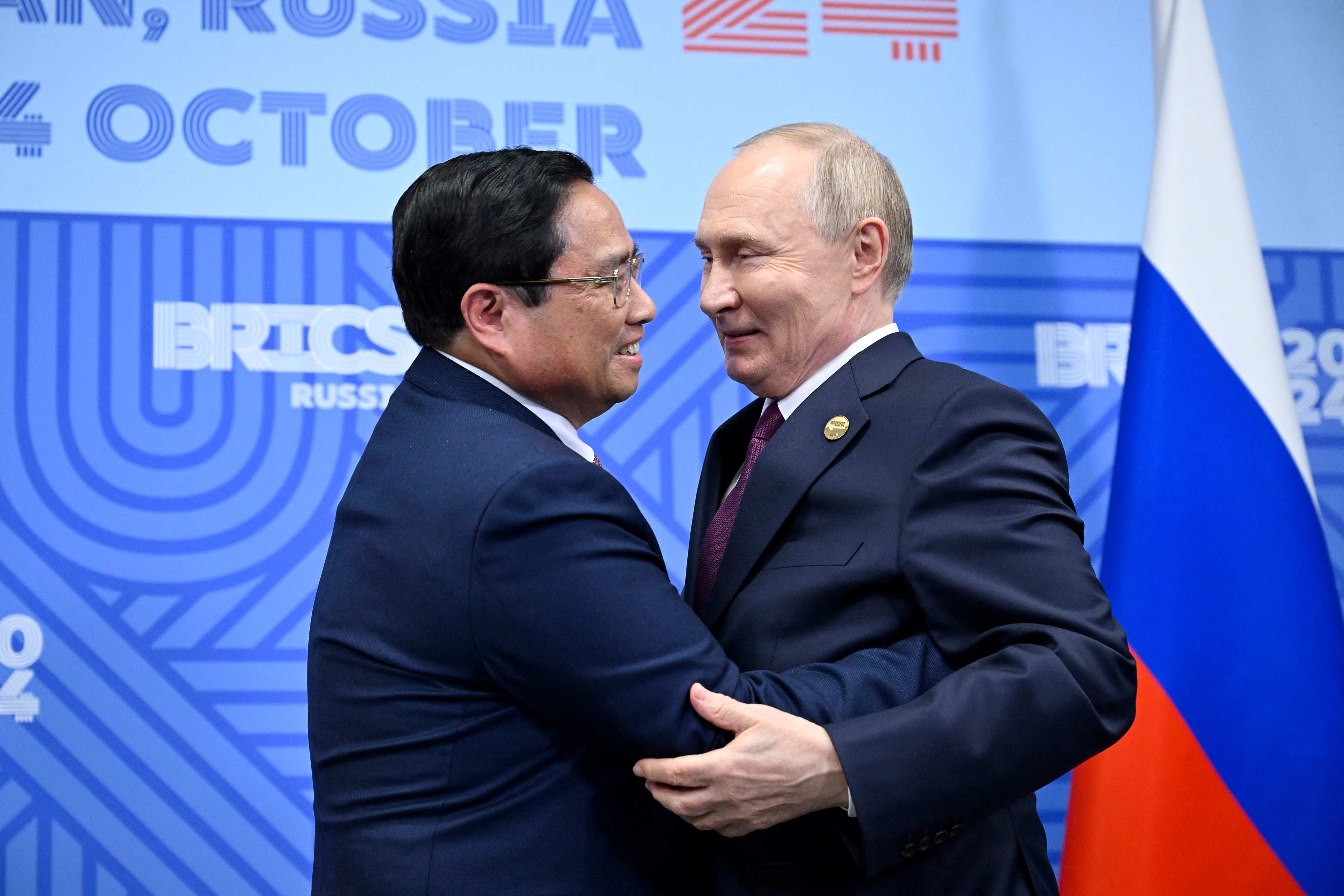 Russian President Vladimir Putin greets Vietnamese Prime Minister Pham Minh Chinh during their bilateral meeting on the sidelines of the Brics summit in Kazan on October 24. Photo: AFP