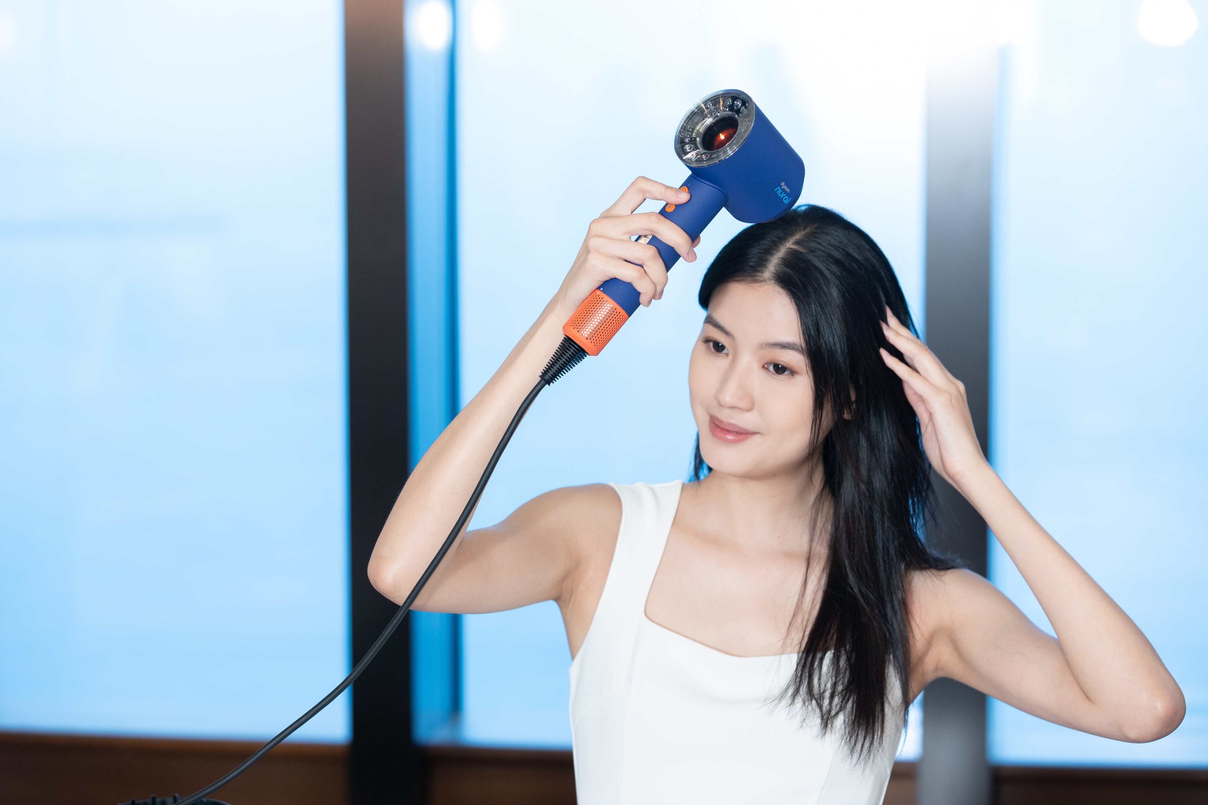 A model uses the Supersonic Nural at an event in Hong Kong in 2024. Despite initial scepticism, Dyson’s foray into the beauty industry has been a success. Photo: Dyson