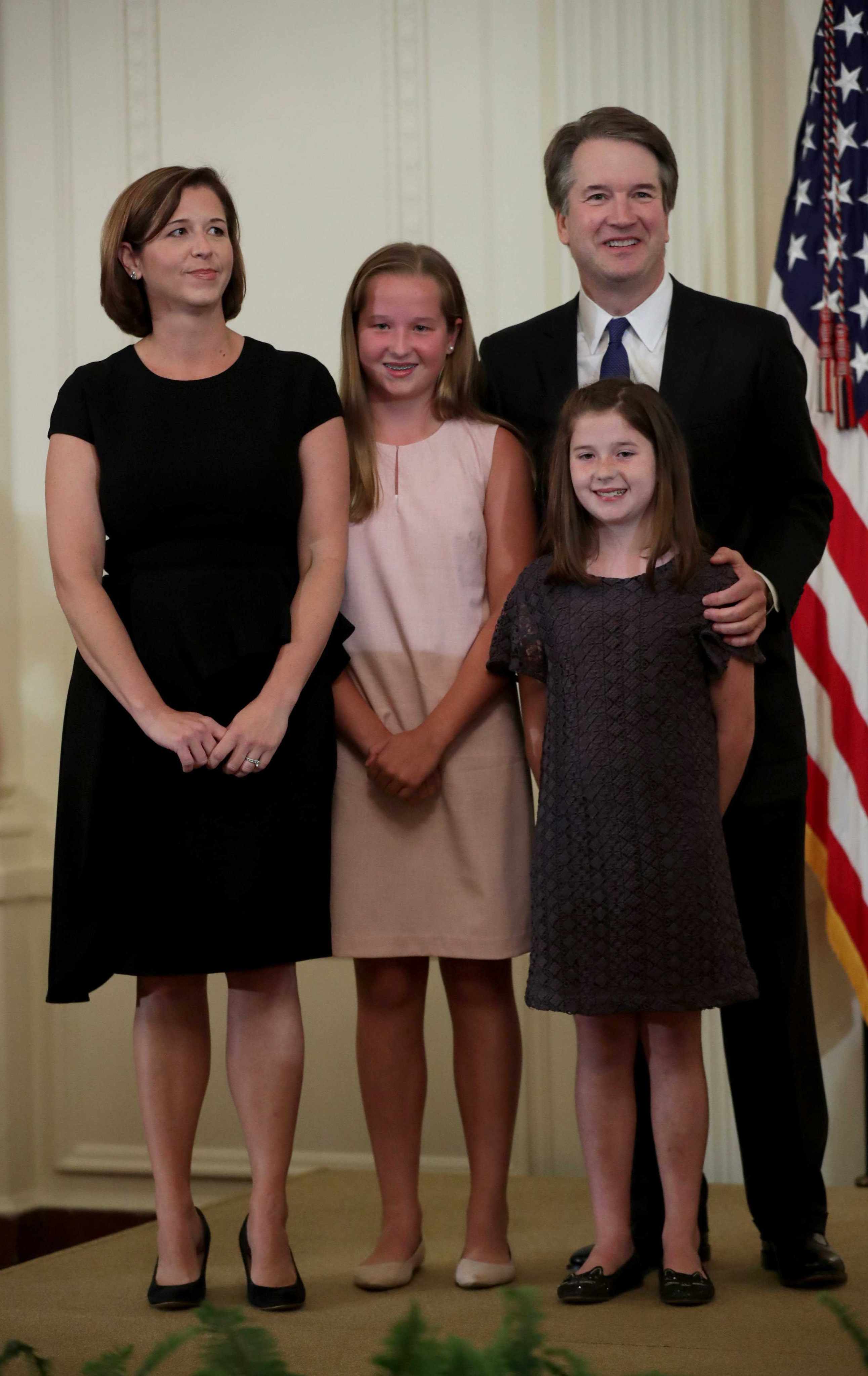 Brett M. Kavanaugh stands with his wife, Ashley Kavanaugh, and his family. Photo: Getty Images