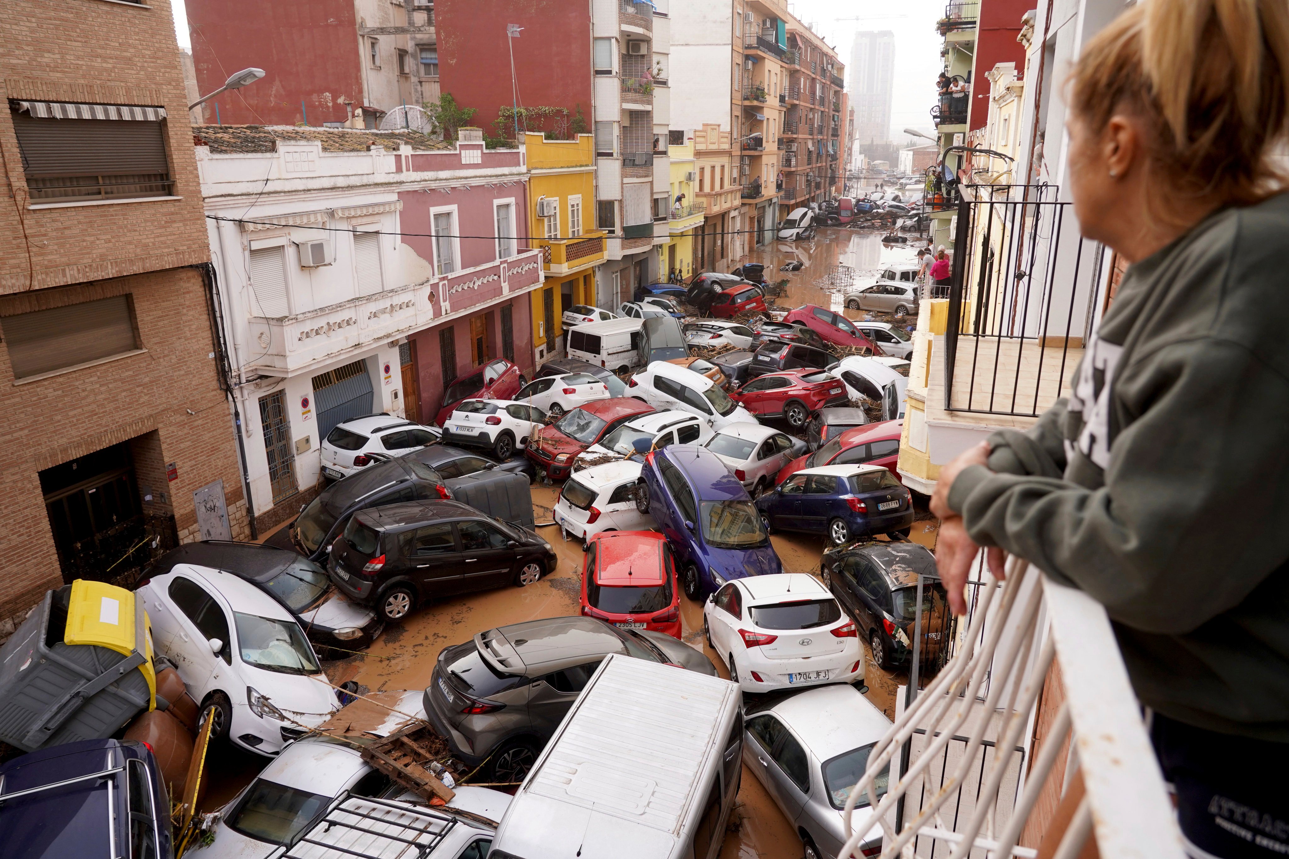 Vehicles piled up in a street from flooding in Valencia, Spain. Photo: AP