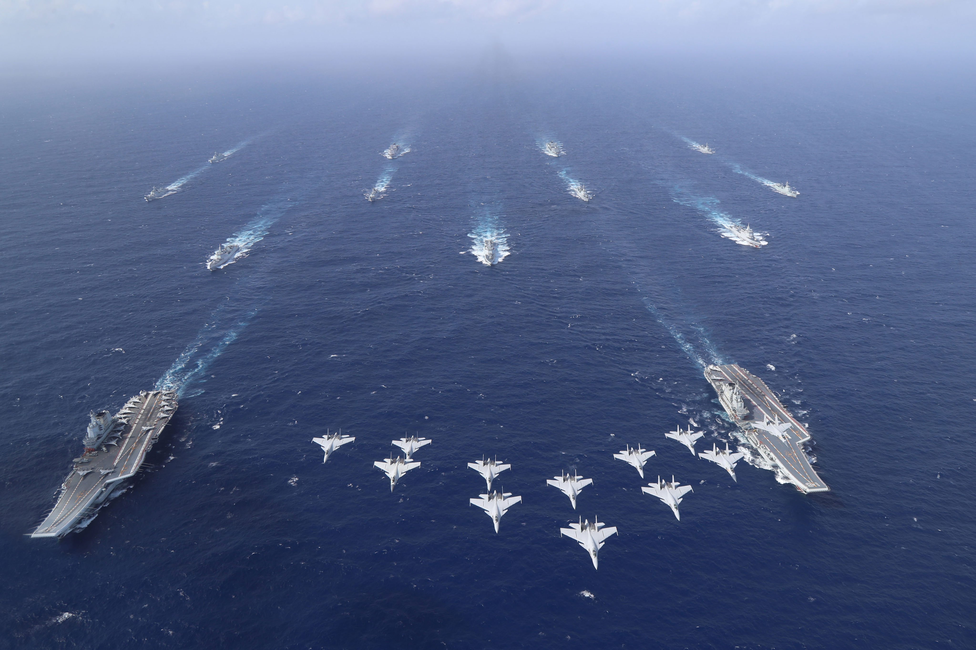 The Shandong and Liaoning sail side by side during the exercises in the South China Sea. Photo: Xinhua