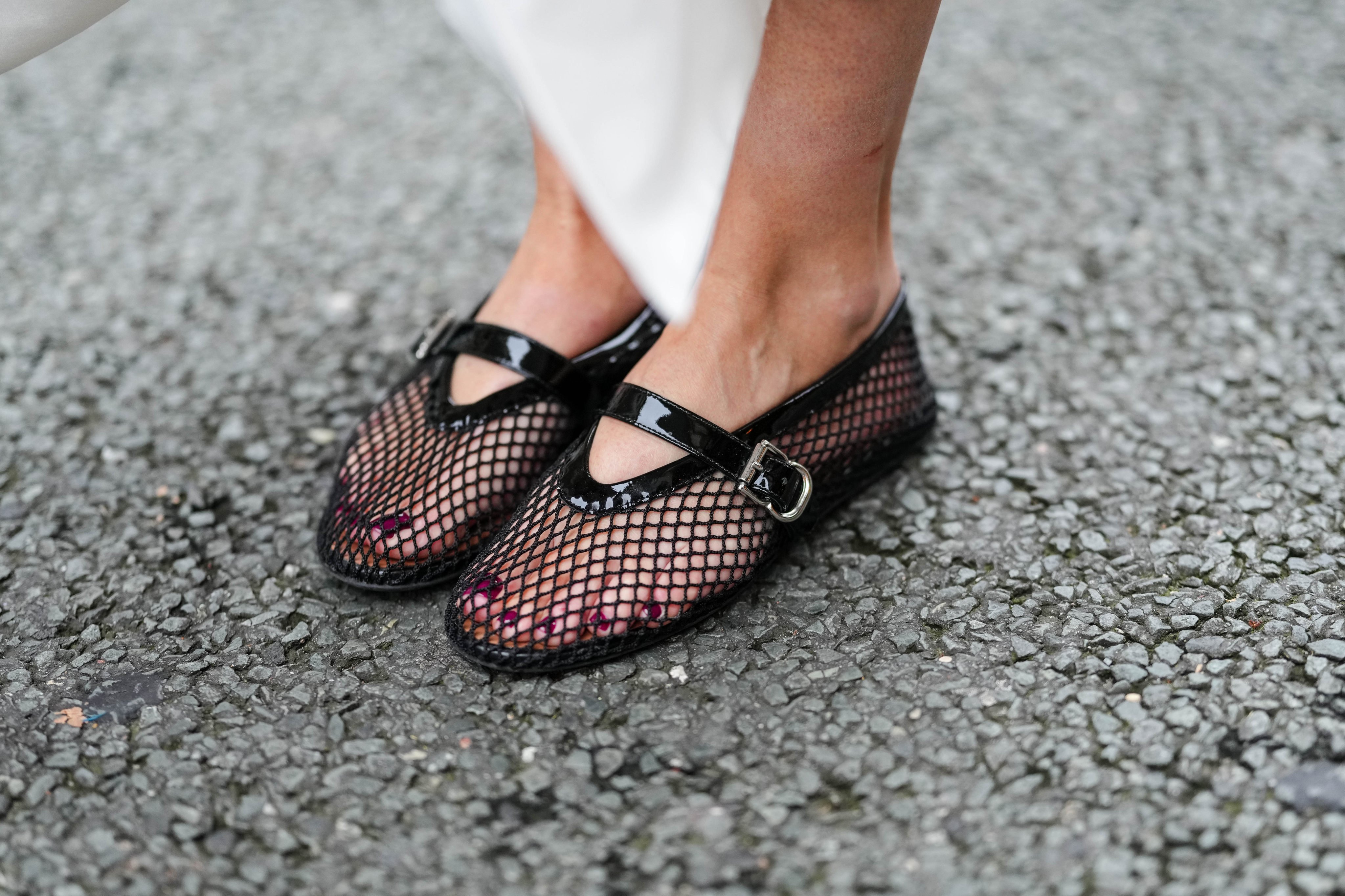 Virginie Conte wears black mesh Alaïa ballerina shoes during a street style fashion photo session, in October, in Paris, France. Photo: Getty Images