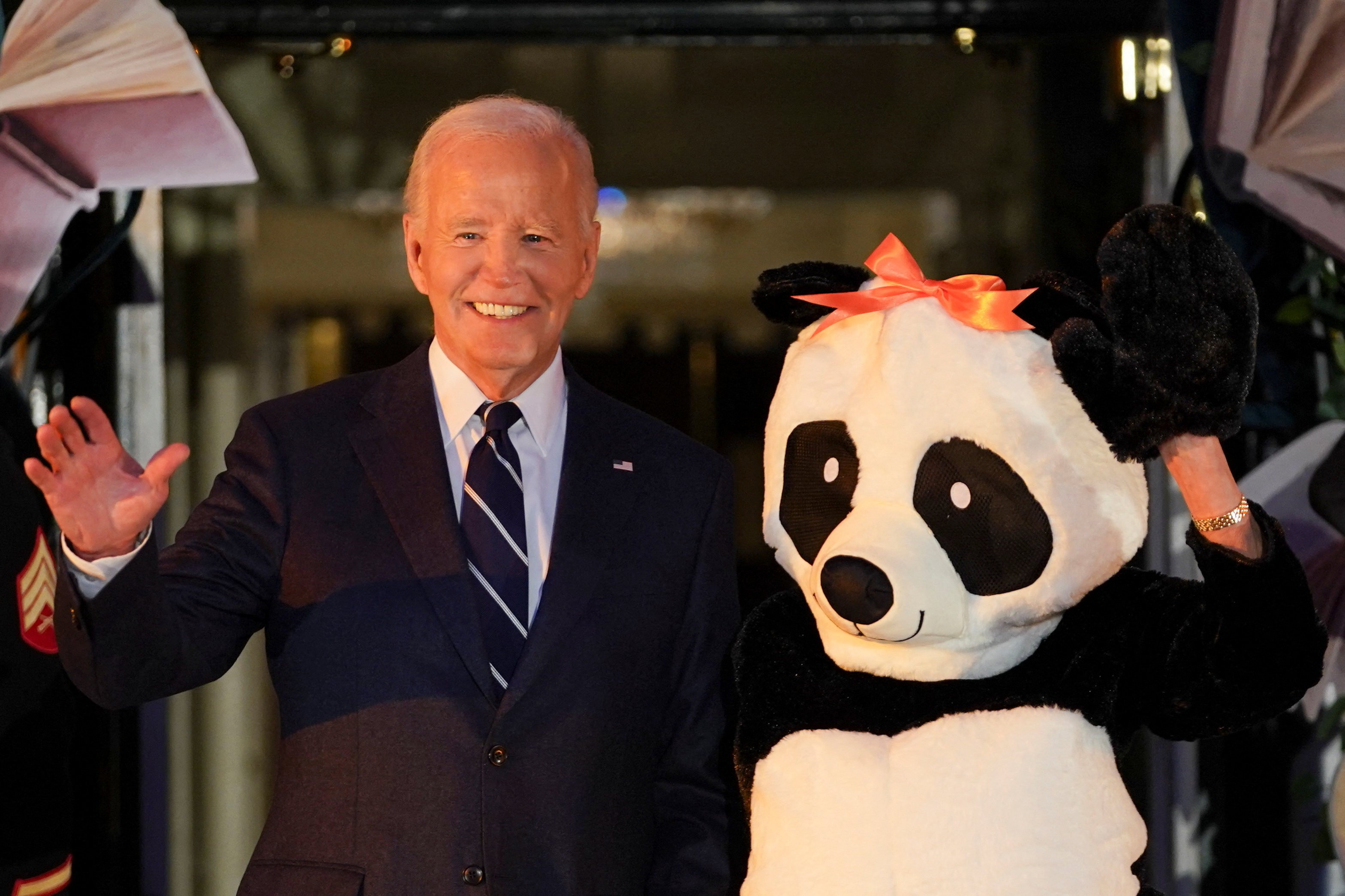 US President Joe Biden and US first lady Jill Biden, in a panda costume. Photo: Reuters