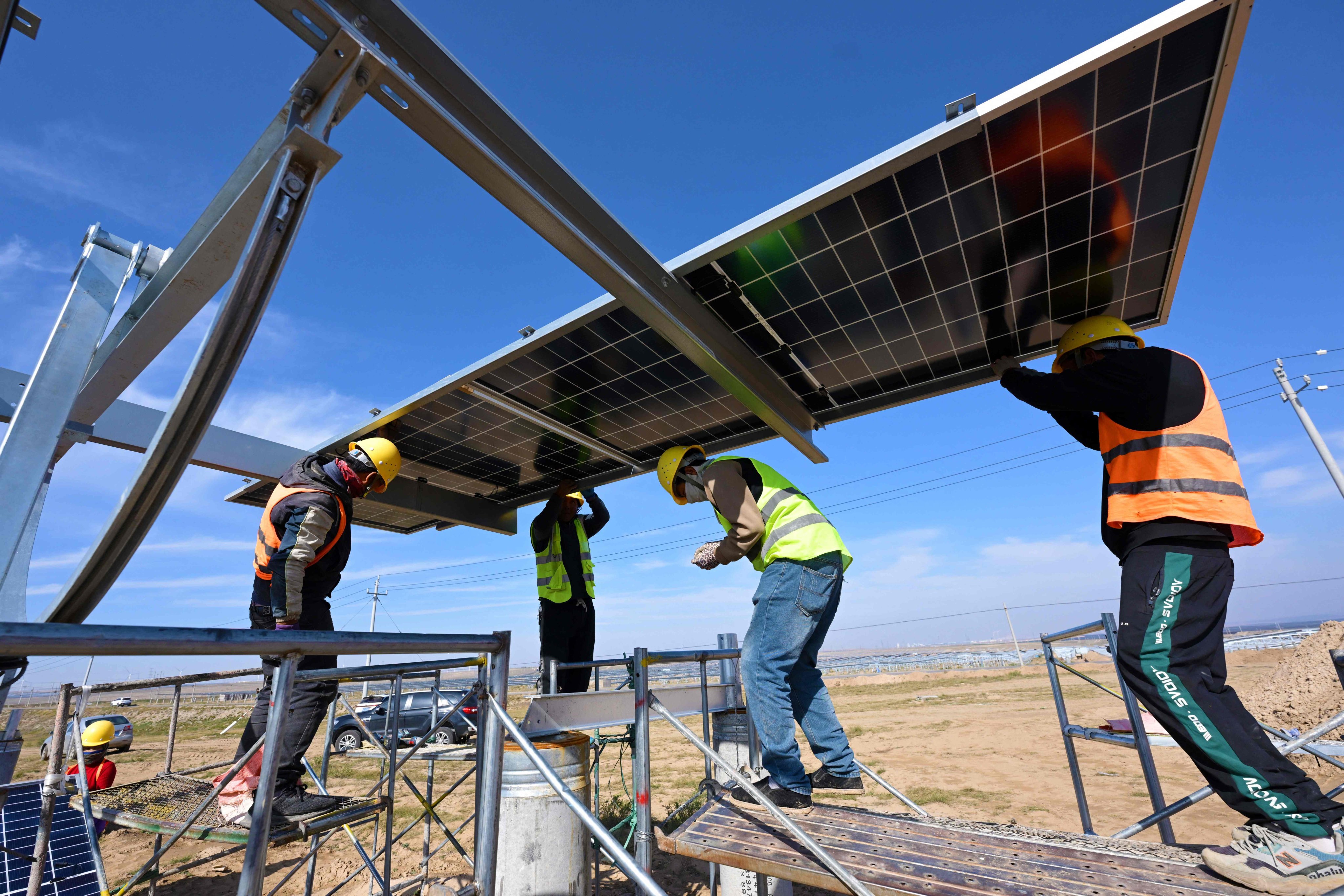 China has unveiled a renewable-energy-substitution plan that spans multiple industries. Photo: AFP