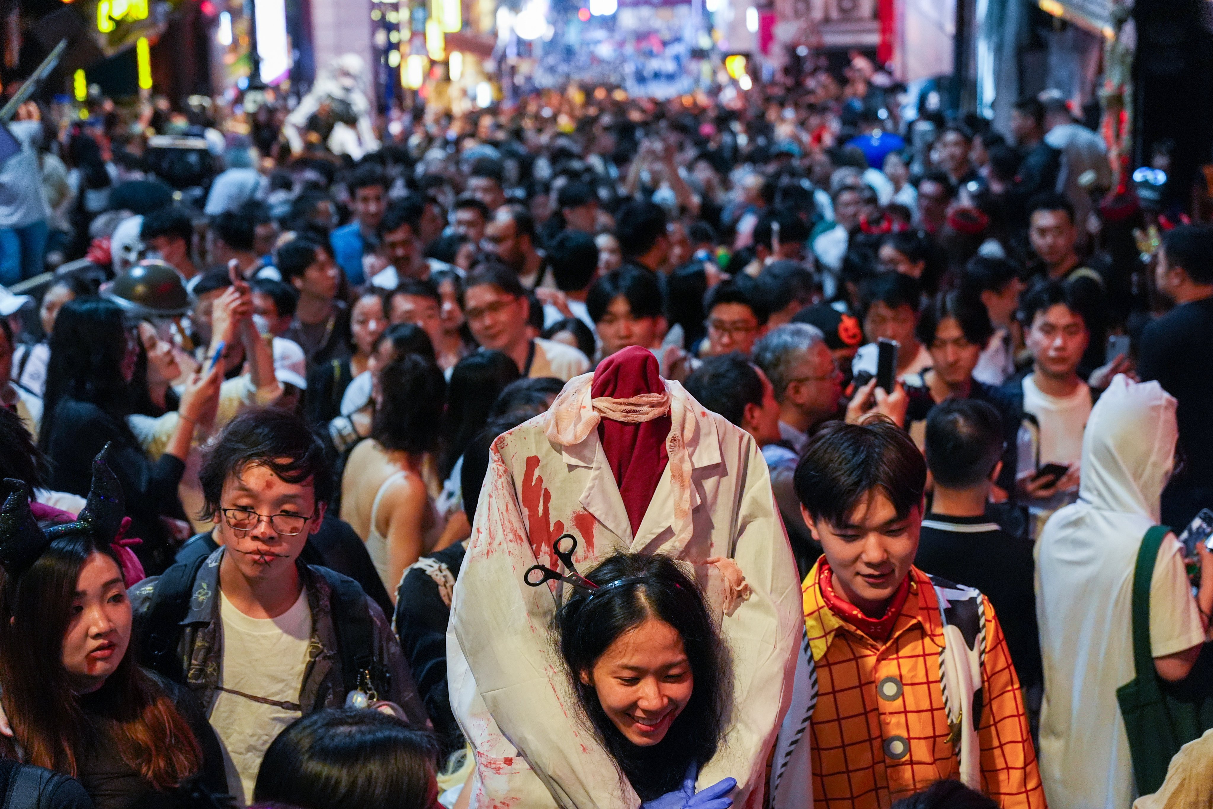 Police estimated that about 25,000 people crowded into the nightlife area, but Lan Kwai Fong Group chairman Allan Zeman said he believed the number would reach as high as 60,000. Photo: Eugene Lee