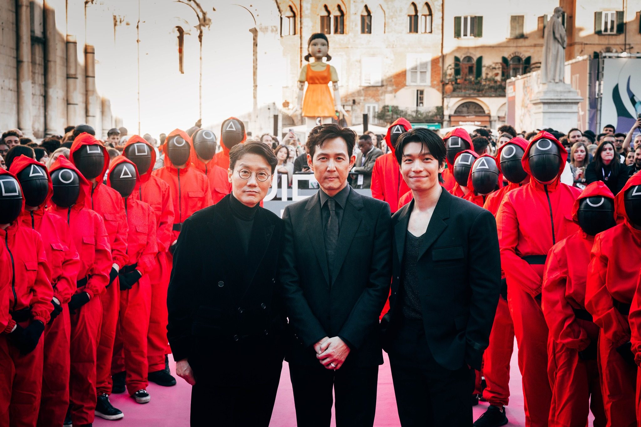 Squid Game creator Hwang Dong-hyuk (left) and stars Lee Jung-jae (centre) and Wi Ha-jun at a fan gathering in Lucca, Italy, ahead of the release of season 2 of the hit Netflix K-drama series. Photo: Instagram/@luccacomicsandgames