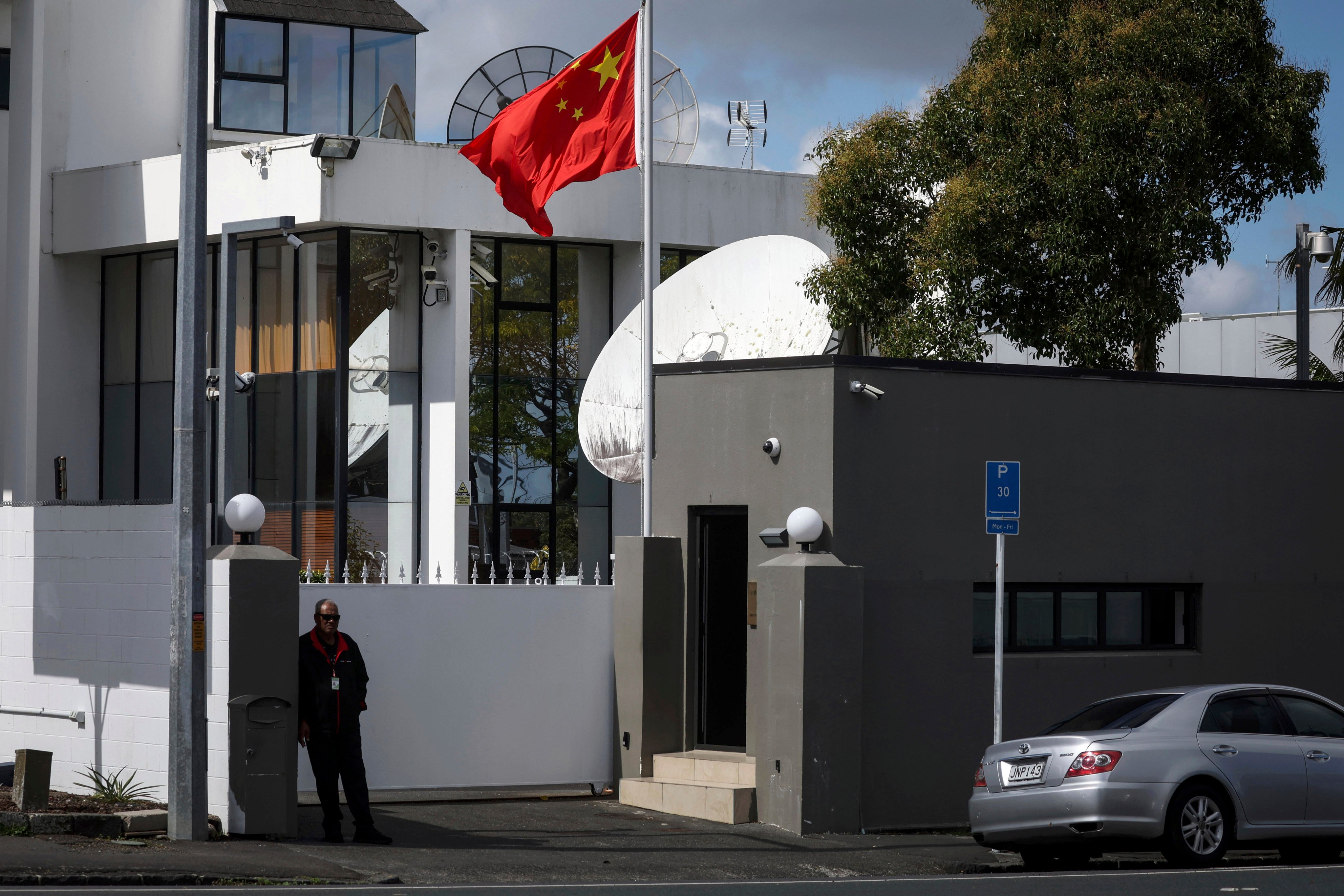 The Chinese flag flies at the Chinese consulate in Auckland, New Zealand. Photo: New Zealand Herald via AP