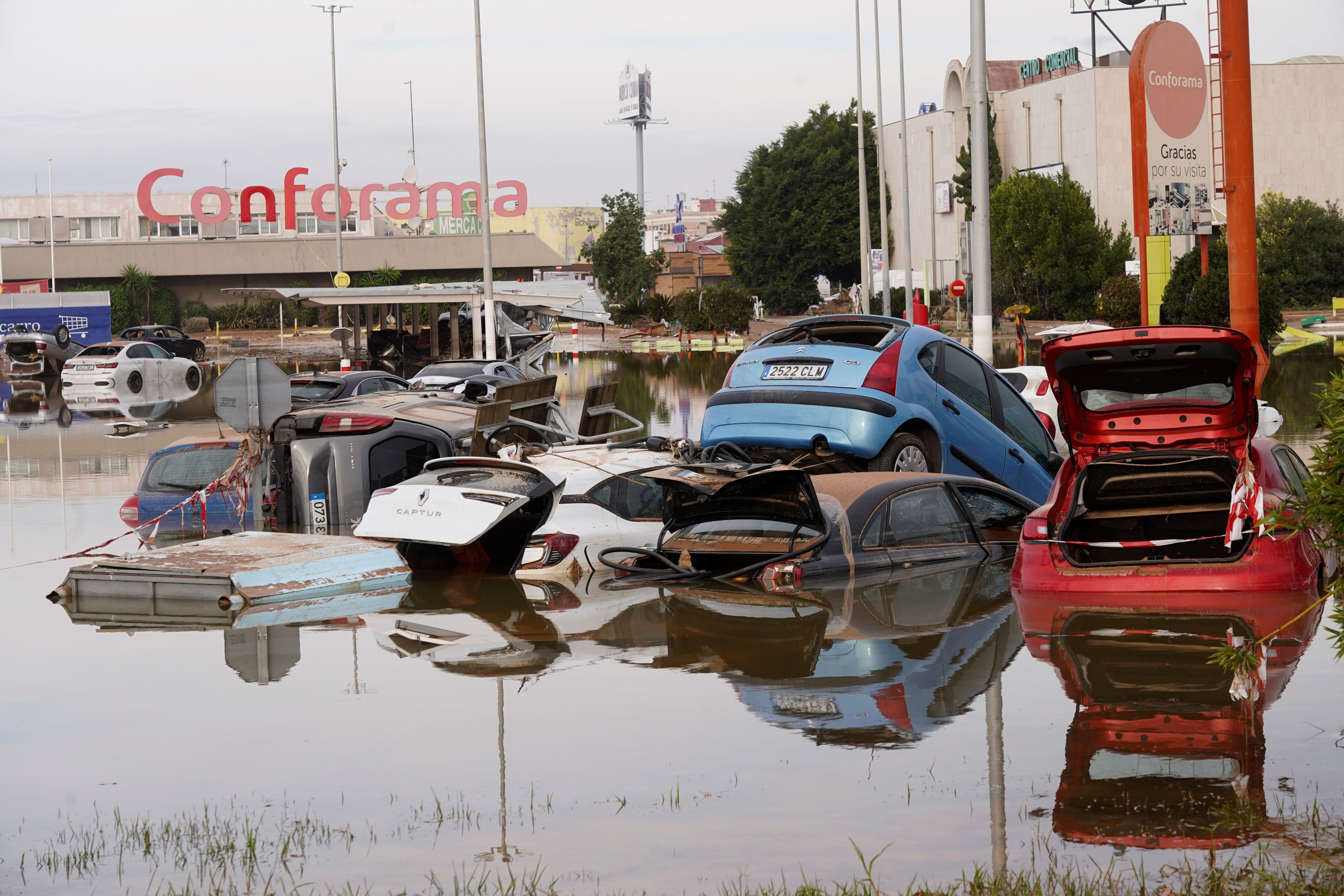 Cars are seen half submerged after floods in Valencia, Spain on November 1. Photo: AP