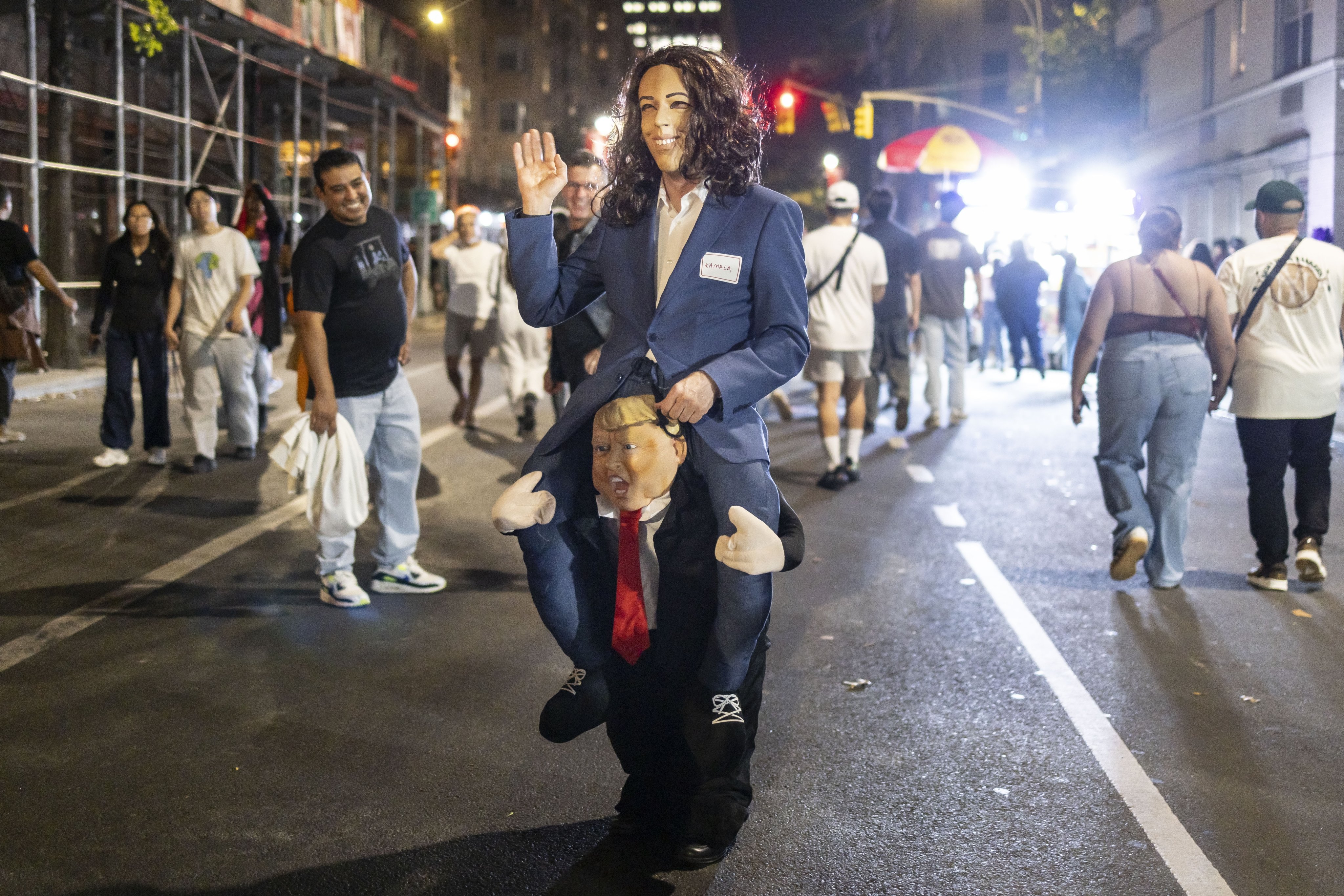 A person in a Kamala Harris and Donald Trump costume attends the 51st Annual Village Halloween Parade in New York on October 31. Photo: EPA-EFE