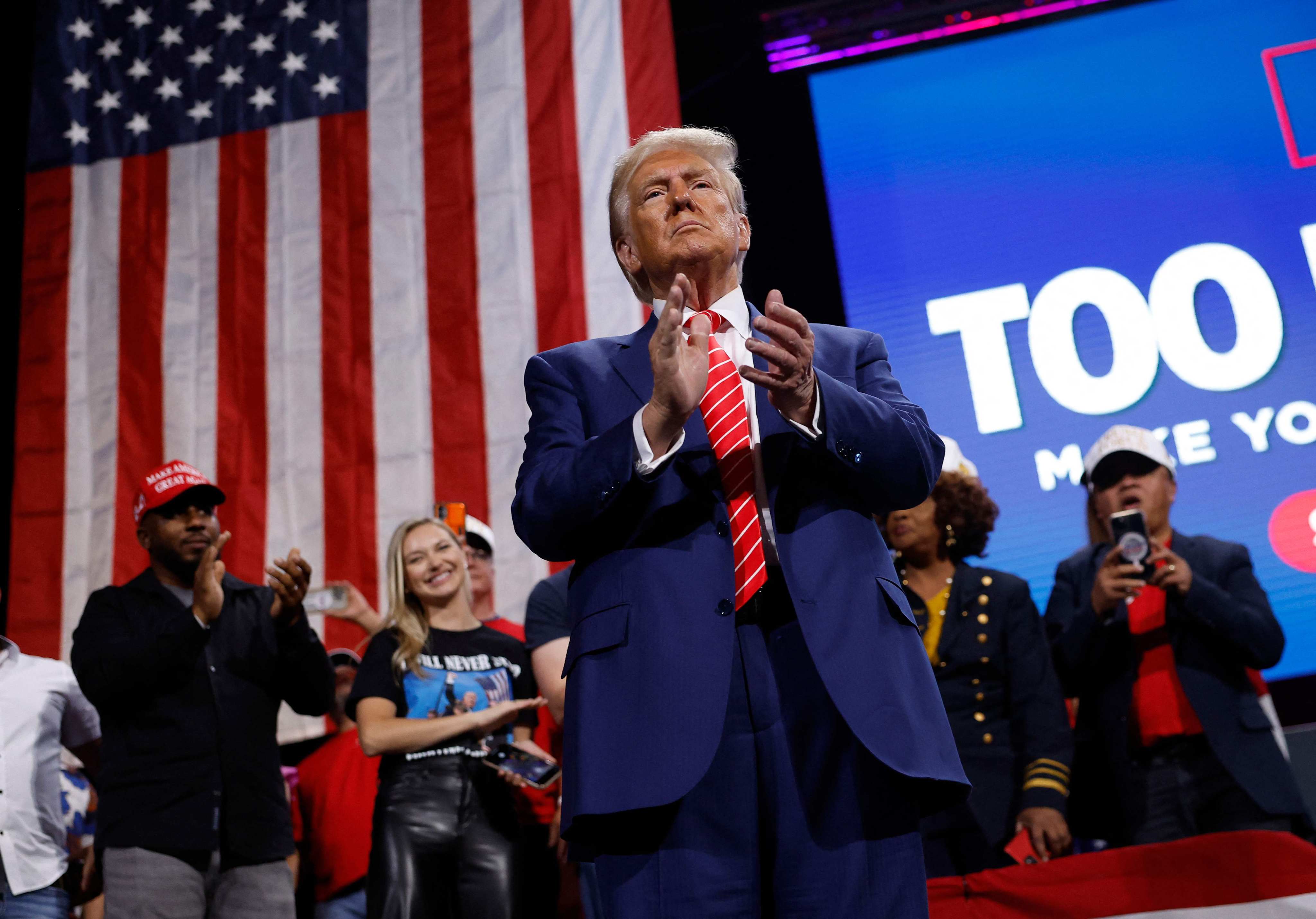 Former US president and Republican presidential nominee Donald Trump applauds during a campaign rally in Atlanta, Georgia on October 15, 2024. Photo: AFP