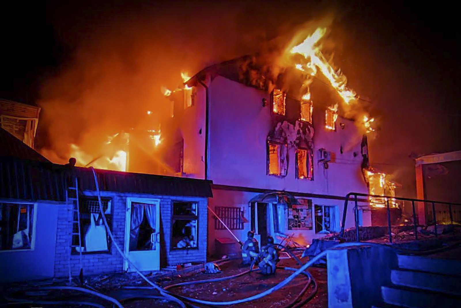 Ukrainian rescuers working at a burning residential building in Mykolaiv, Ukraine, amid the ongoing Russian invasion. Photo: EPA-EFE