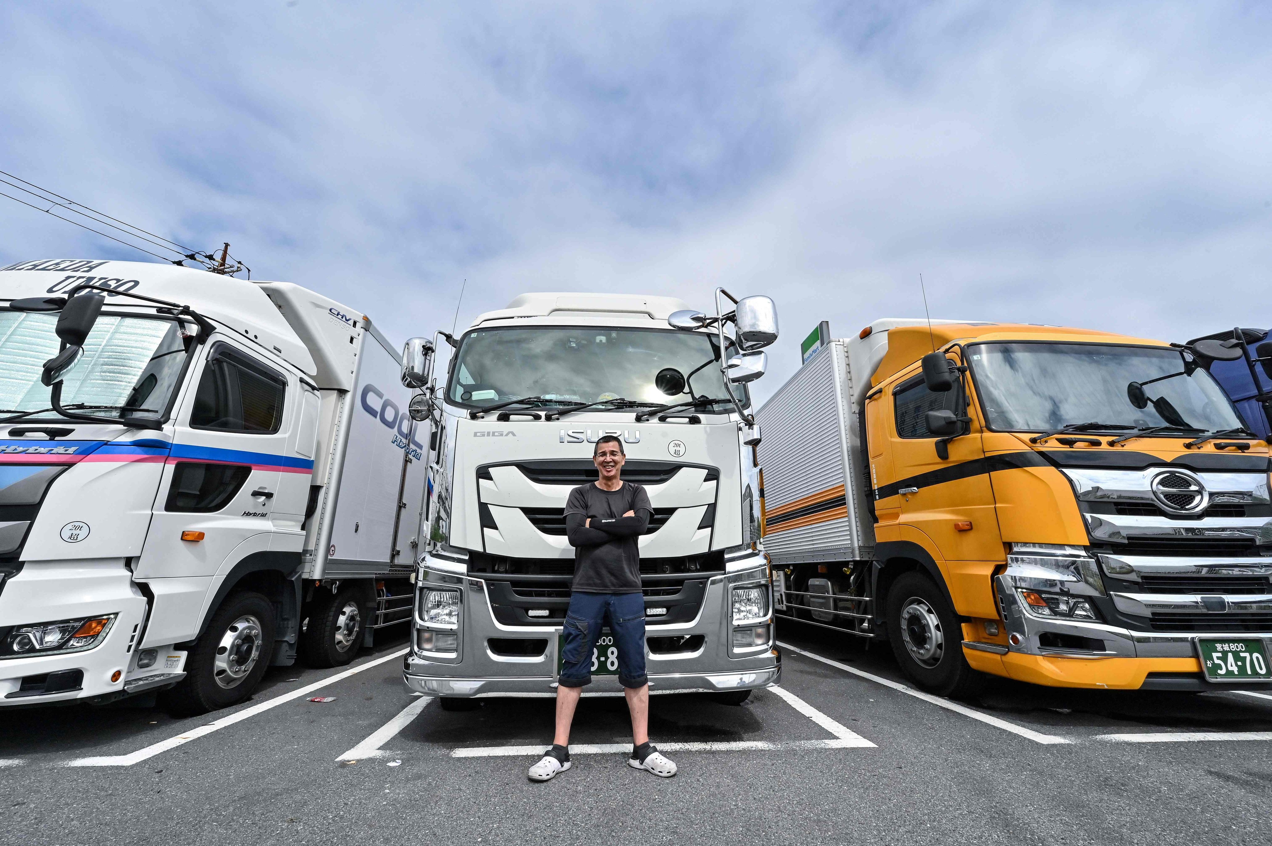 Japanese truck driver Fujio Uemura in front of his truck at a truck stop in the city of Kawasaki, Kanagawa prefecture, on September 4. Photo: AFP