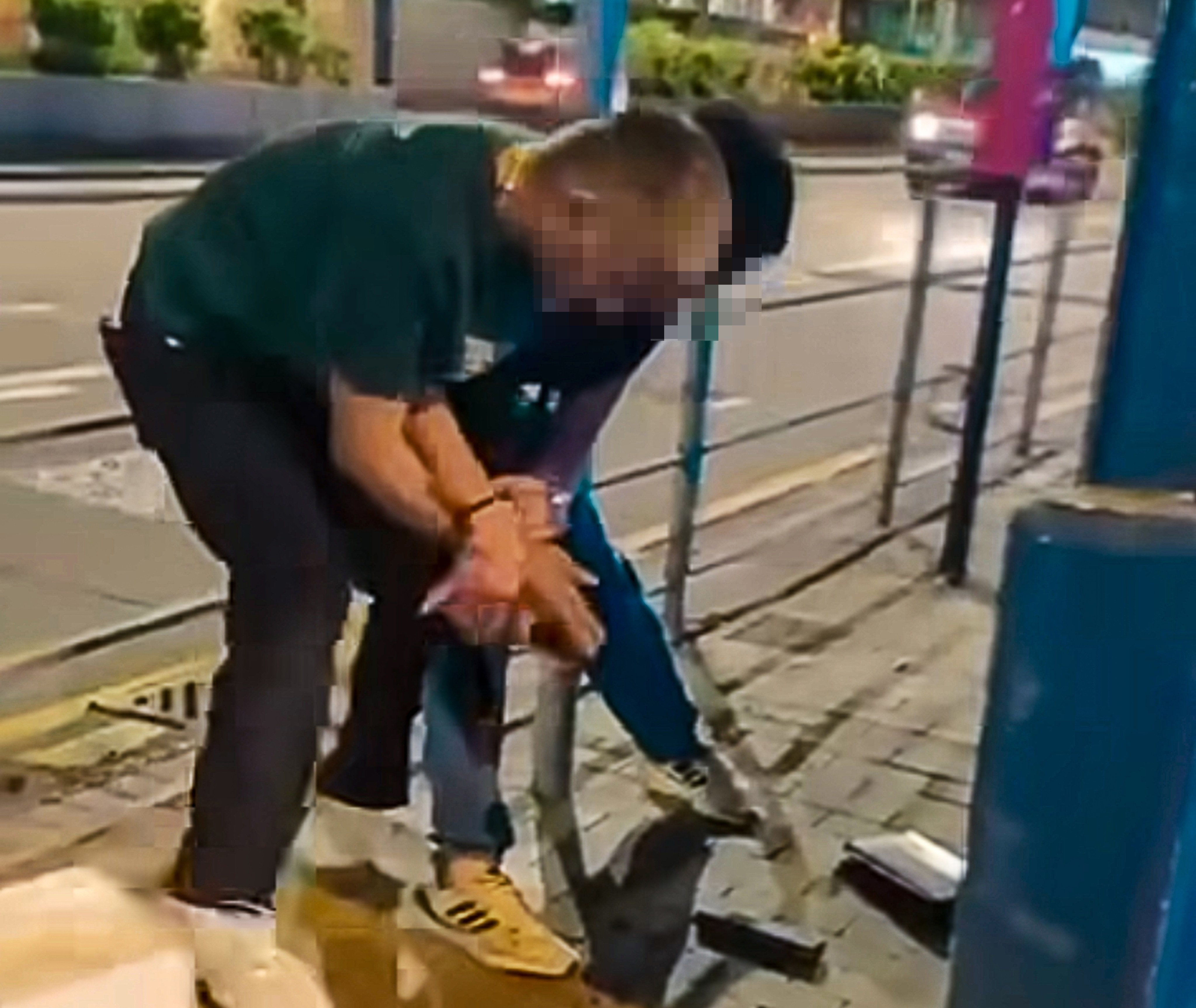 An off-duty policeman (right) was repeatedly stabbed in the neck, hands and legs in a suspected robbery on Saturday. Photo: Handout