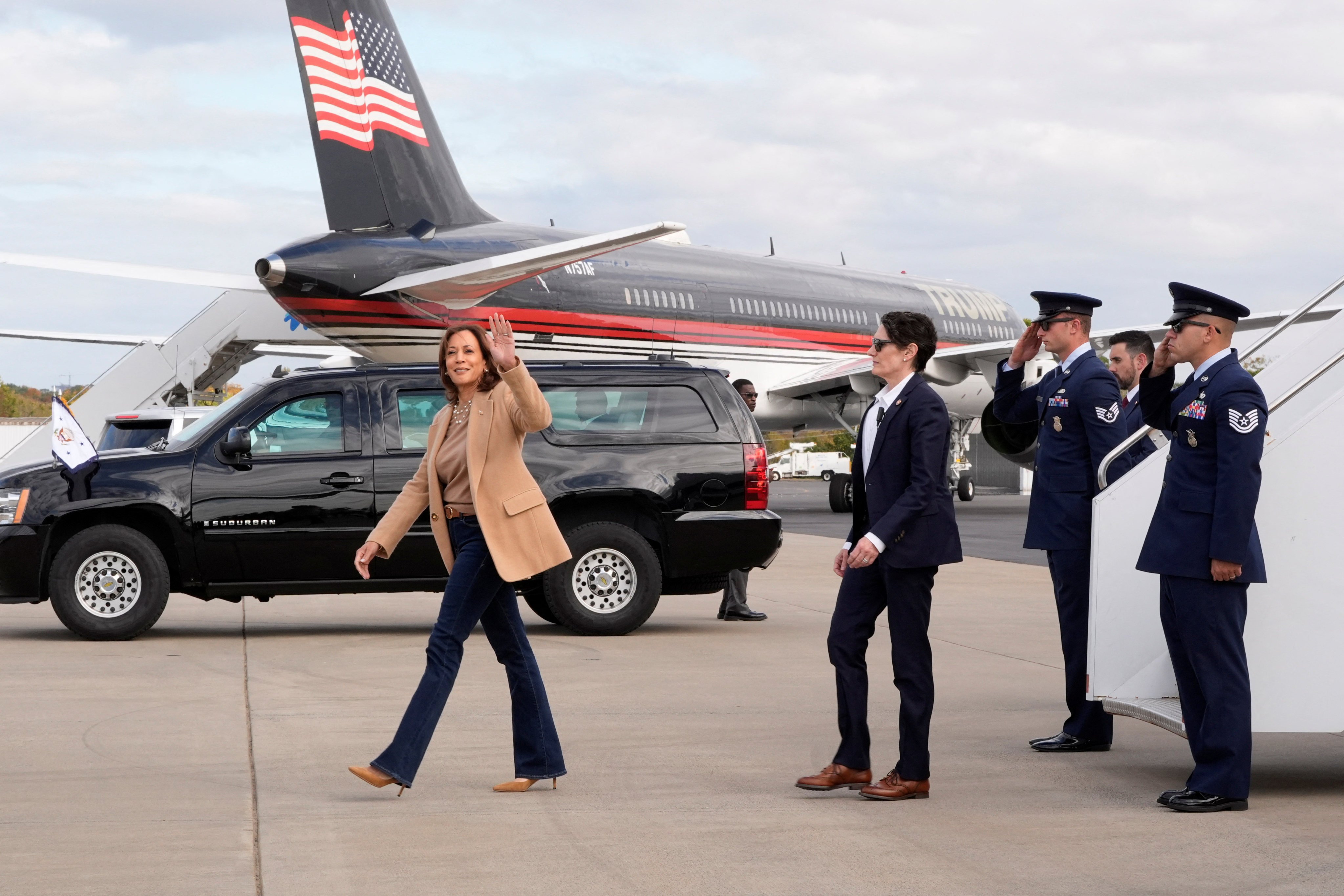 Democratic US presidential nominee Kamala Harris arrives at the airport in Charlotte, North Carolina, on Saturday, with rival candidate Donald Trump’s plane in the background. Photo: Reuters