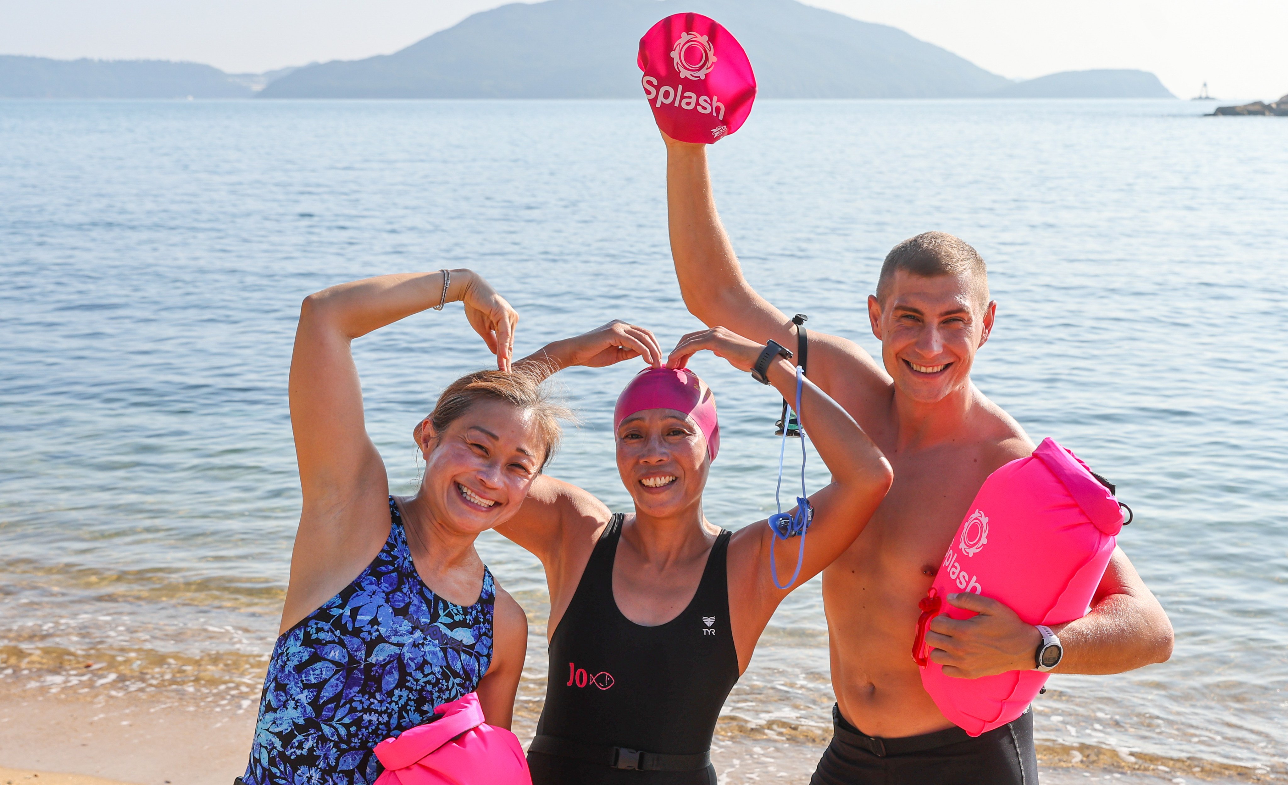 (From left) Jada Lam, Josephine Tolentino and Marko Stojanovic pose for a picture at Shek O Beach before a training session. Photo: Edmond So