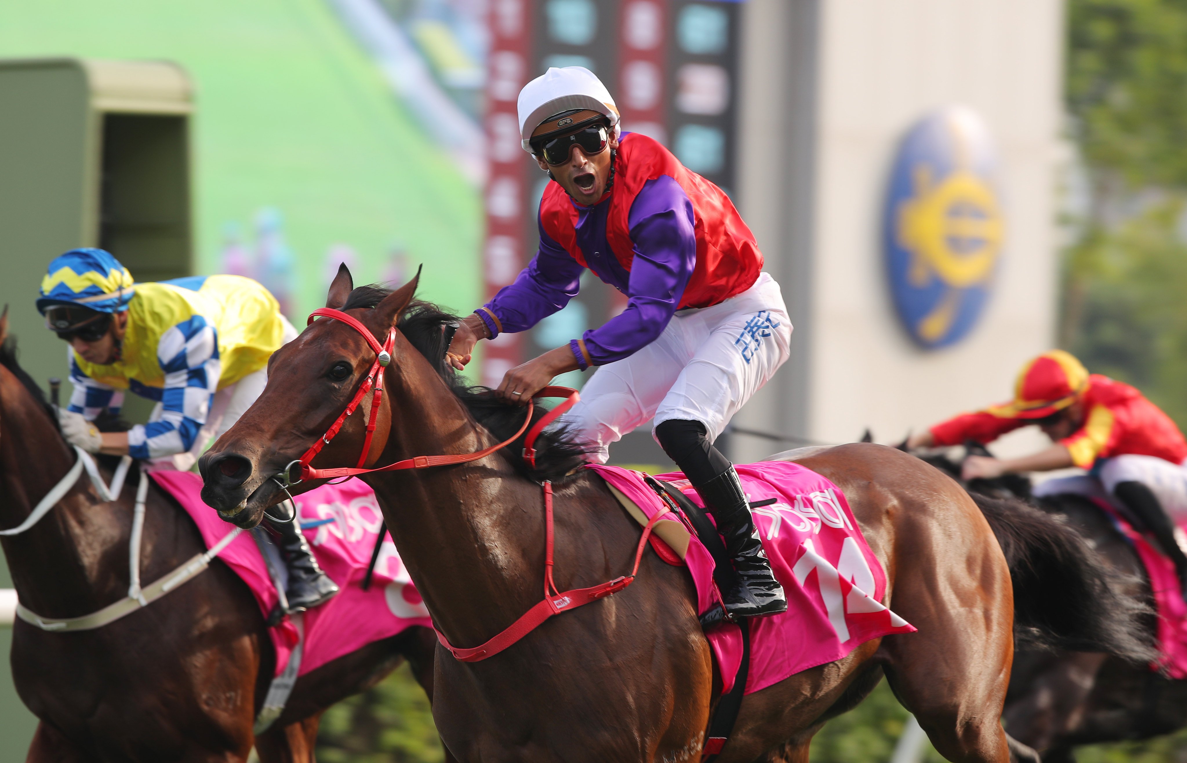 Karis Teetan hollers as Ensued snares Sunday’s Group Three Sa Sa Ladies’ Purse (1,800m). Photos: Kenneth Chan