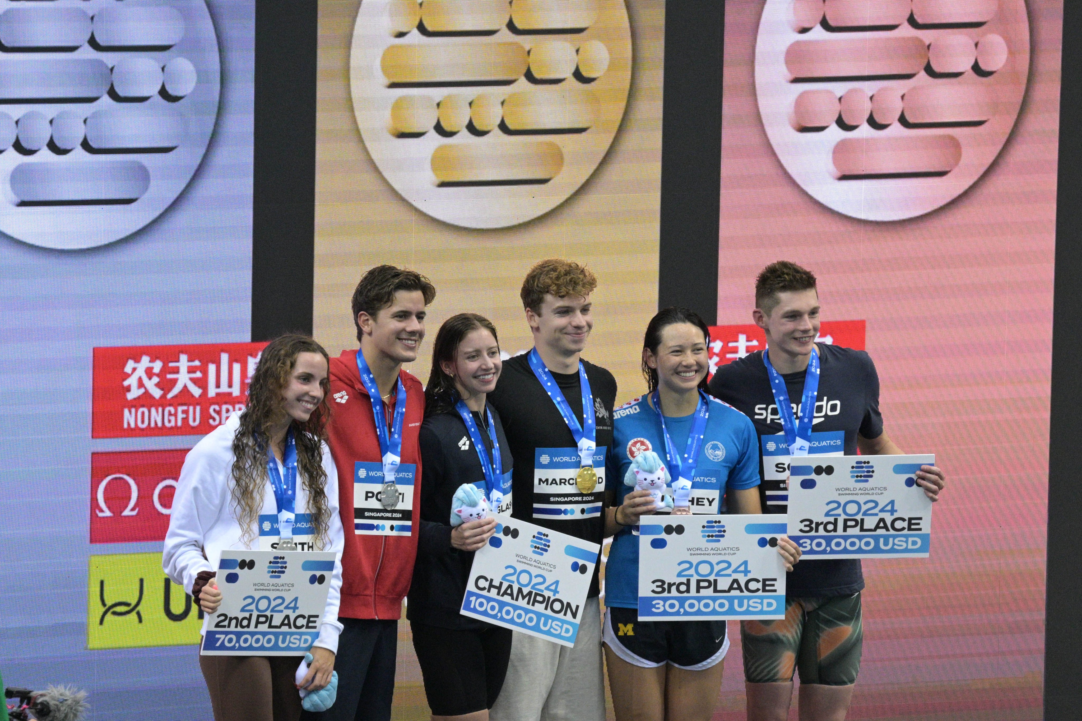 From left to right, Regan Smith, Noe Ponti, Kate Douglass, Leon Marchand, Siobhan Haughey and Duncan Scott celebrate their World Cup achievements. Photo: Xinhua