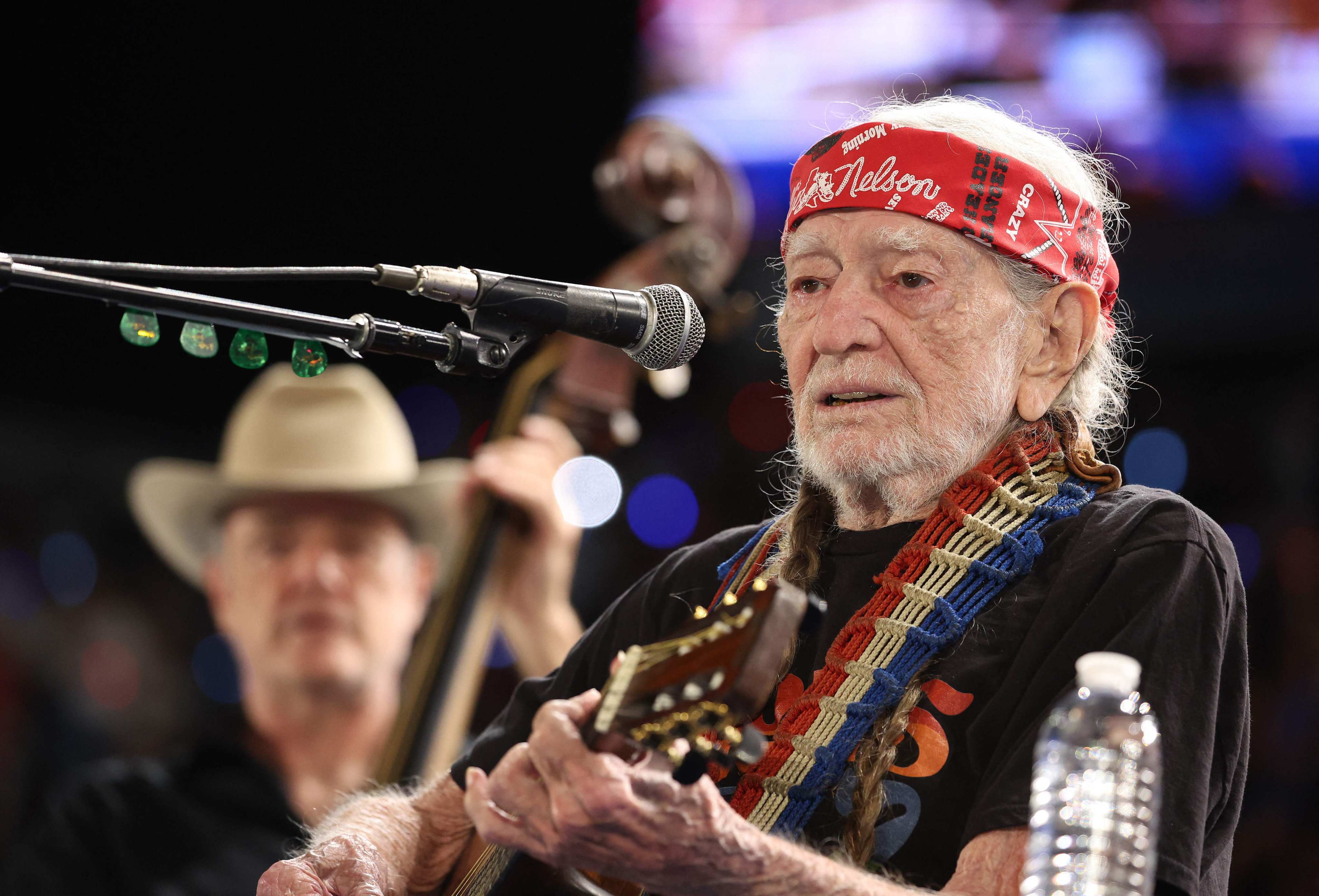 Musician Willie Nelson performs during a campaign rally with Democratic presidential candidate, US Vice-President Kamala Harris, on October 25, 2024 in Houston, Texas. Has has just released his 153rd album, Last Leaf on the Tree. Photo: Getty Images via AFP