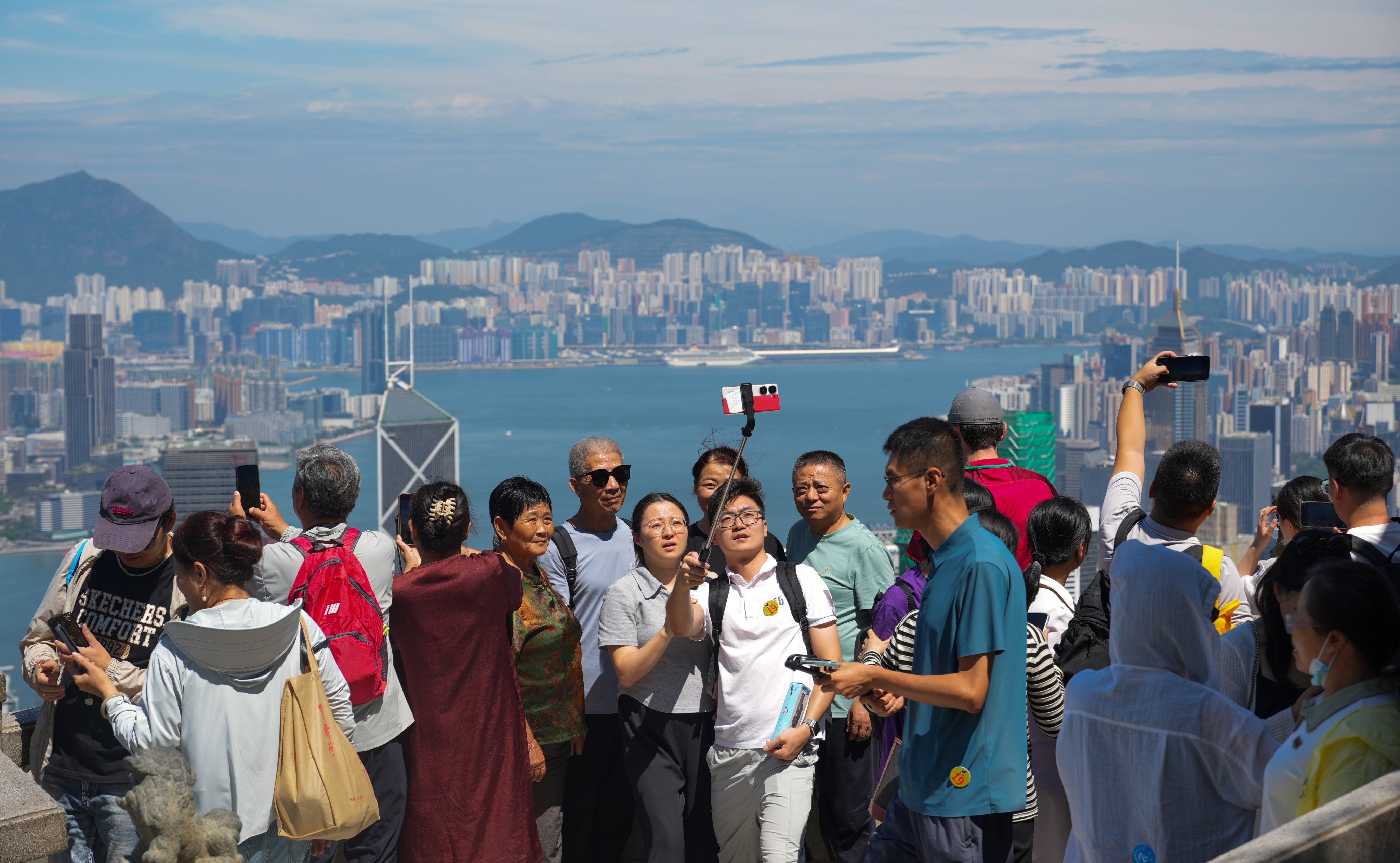 Tourists explore the scenic Lions Pavilion at The Peak during the National Day ‘golden week’ holiday on 2 October 2024. Photo: May Tse