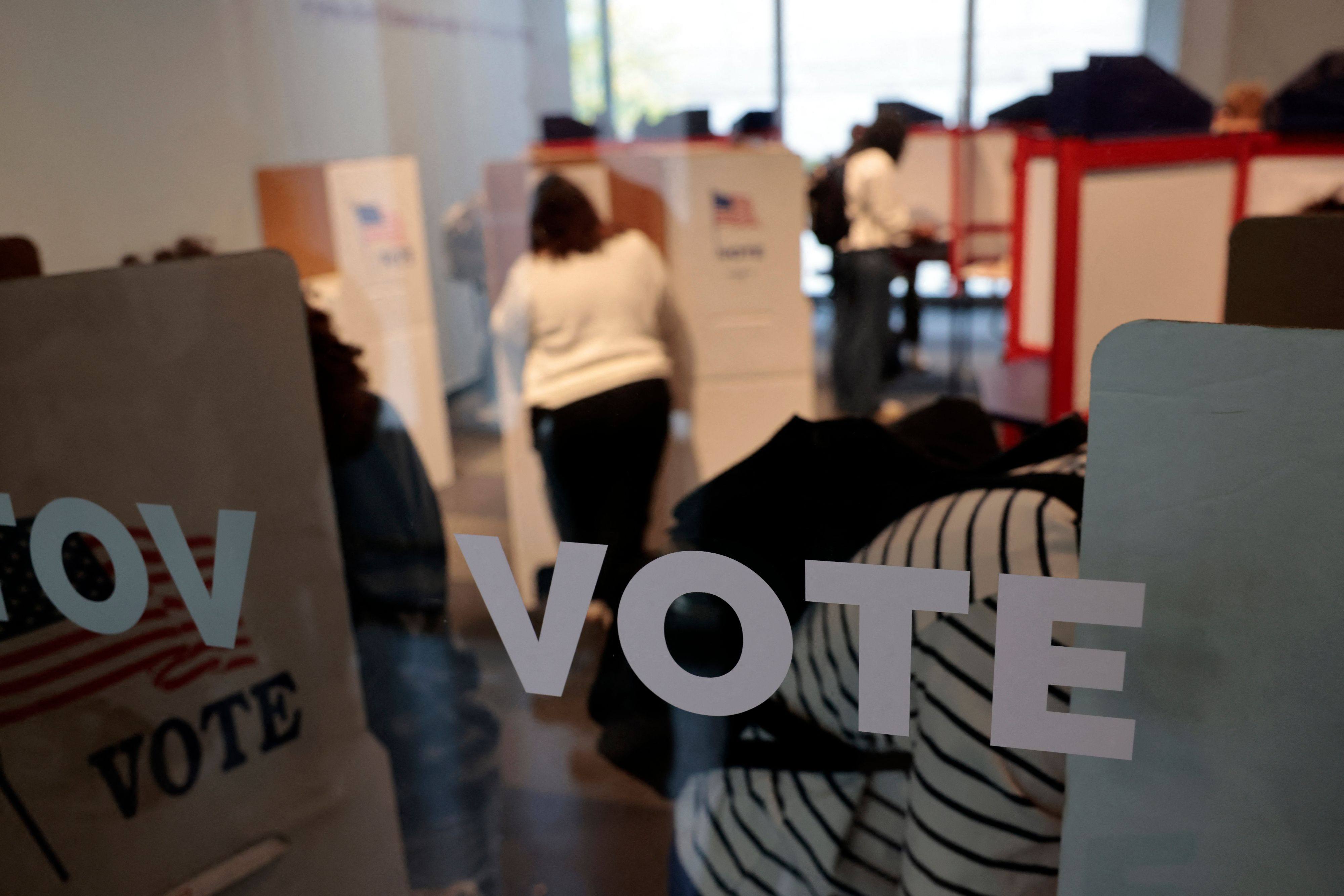 People cast their in-person early ballot at a polling station in Ann Arbor, Michigan. Photo: AFP