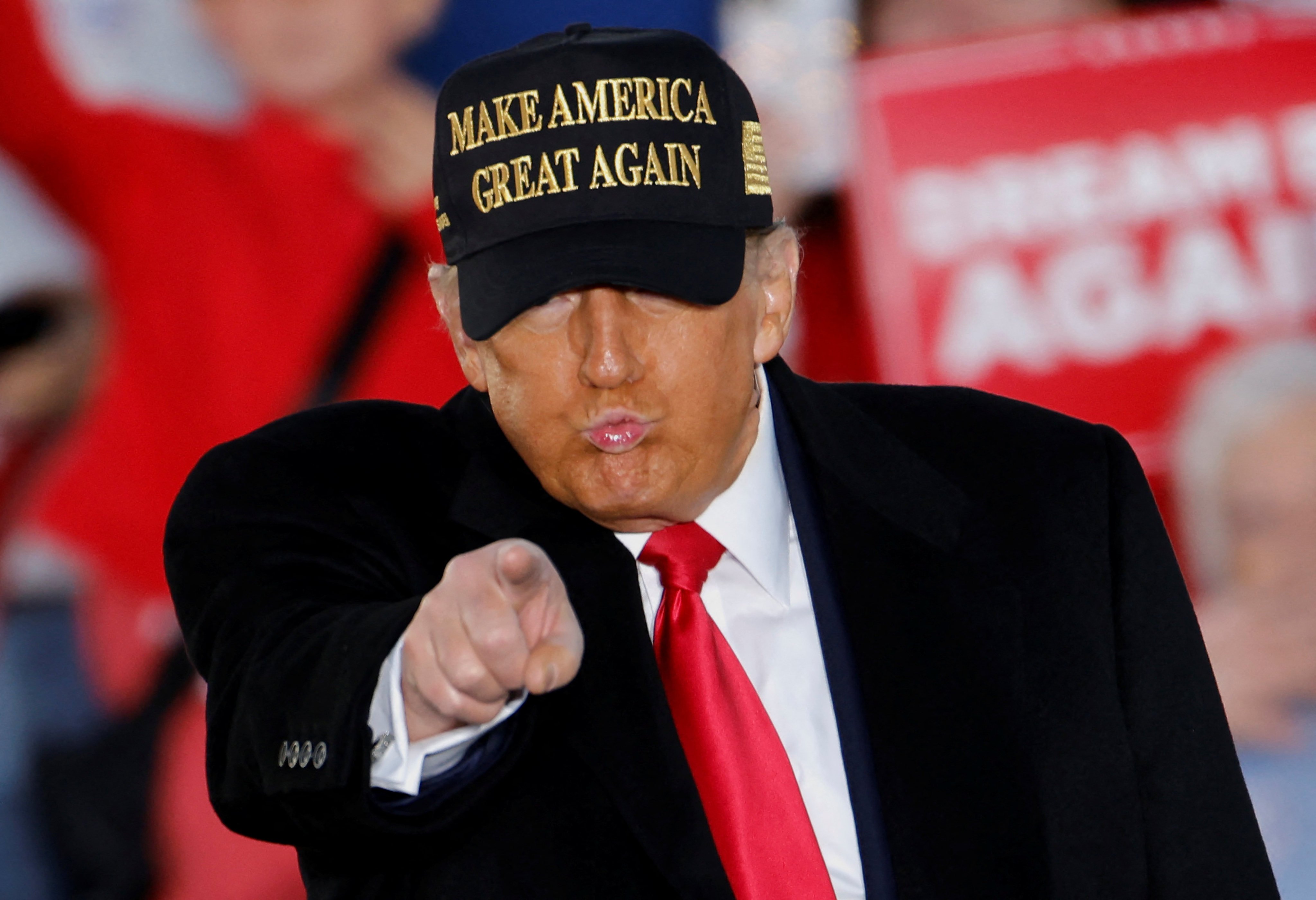 Republican presidential nominee and former US president Donald Trump points as he speaks during a rally in North Carolina on Sunday. Photo: Reuters