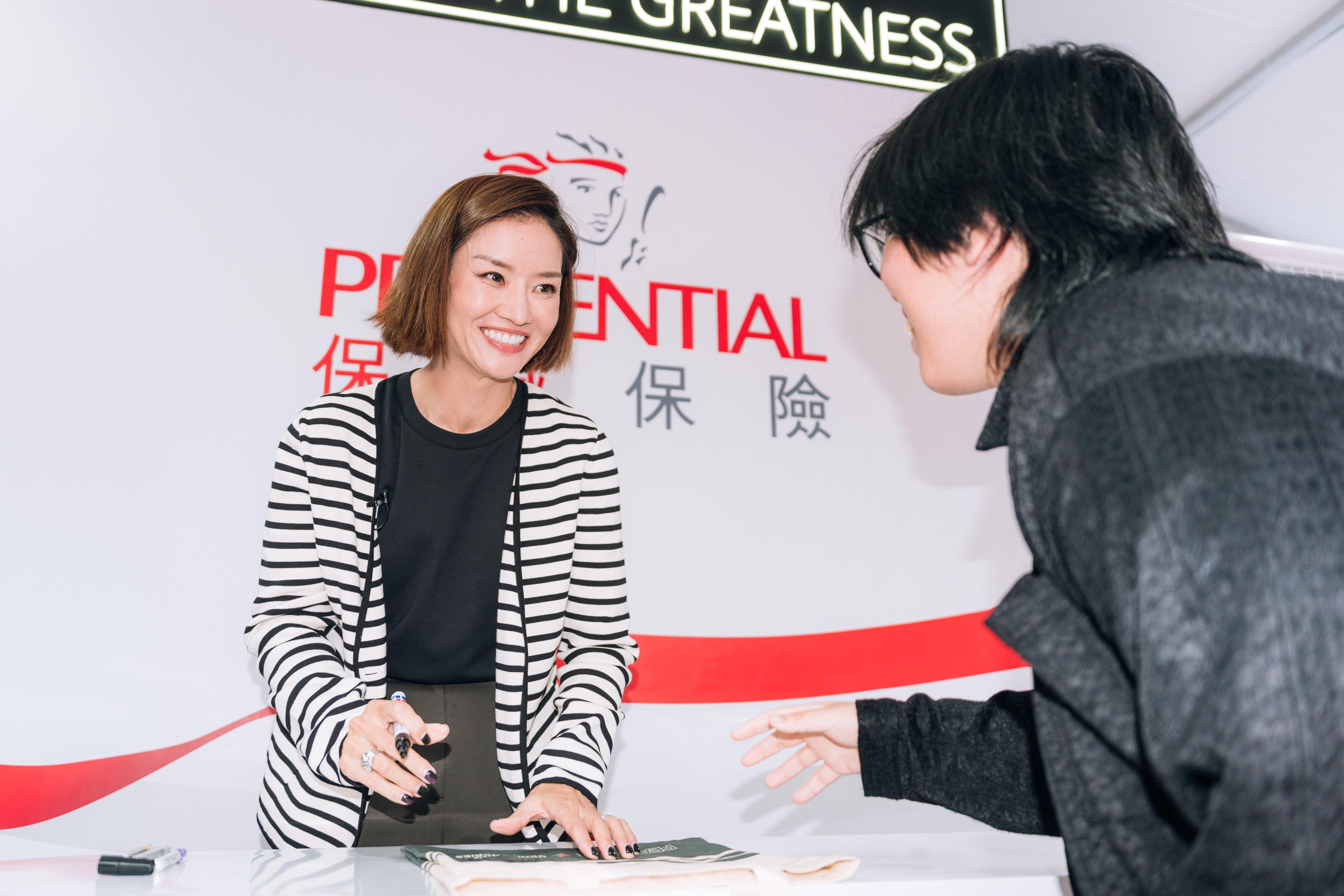 Chinese tennis legend and Hong Kong Open tournament director Li Na meeting fans at Victoria Park Tennis Court. Photo: Hong Kong, China Tennis Association