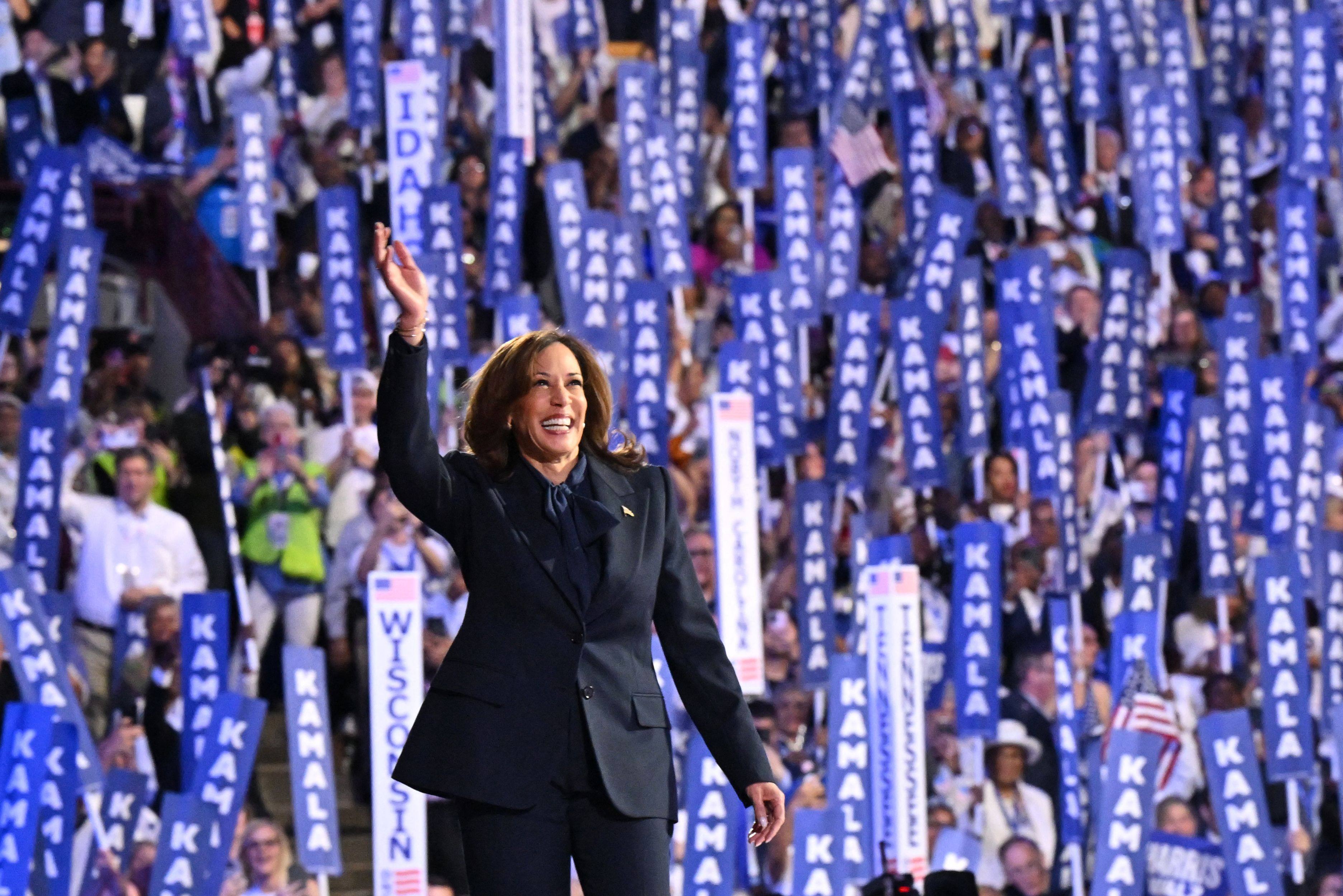 For Kamala Harris, pictured here on the final day of the Democratic National Convention, the power pantsuit became a go-to wardrobe item on the campaign trail. Photo: AFP