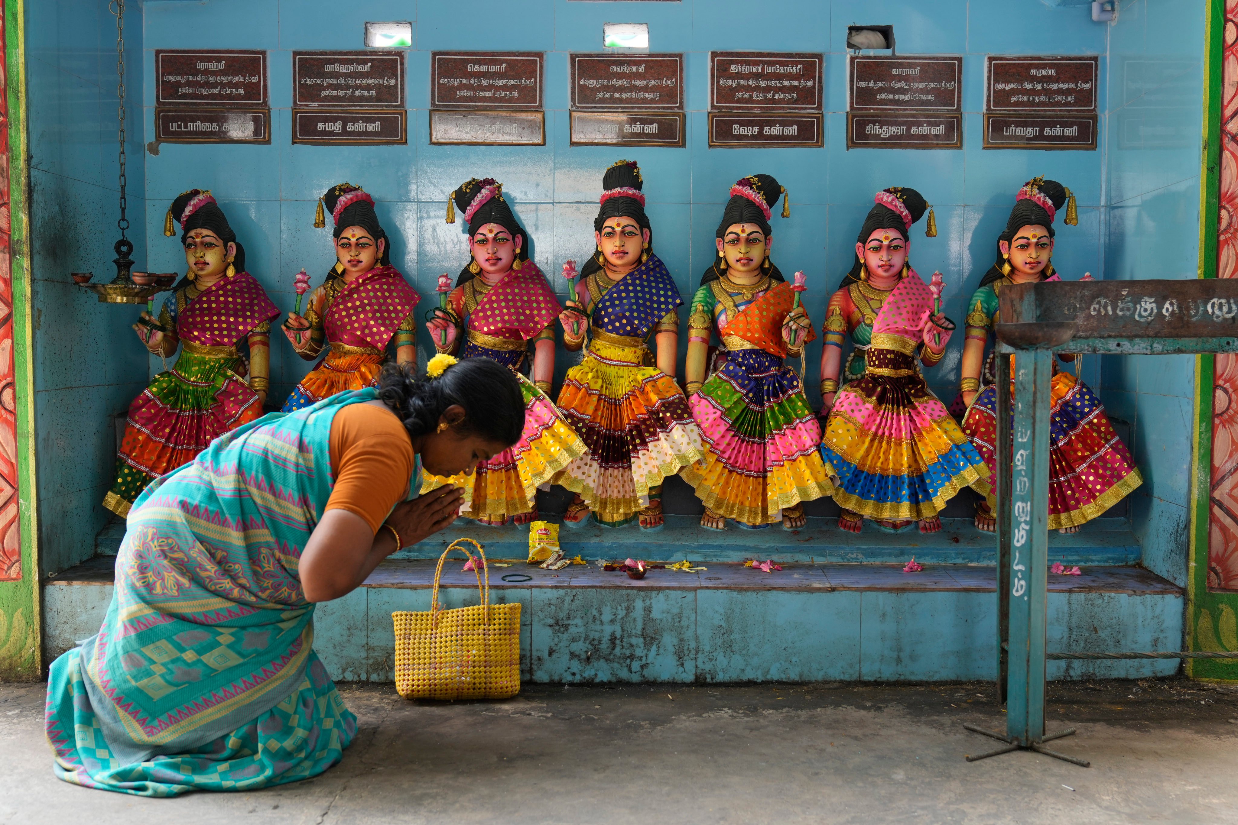 A villager prays for Democratic presidential nominee, Vice-President Kamala Harris, at Sri Dharmasastha temple in Thulasendrapuram. Photo: AP