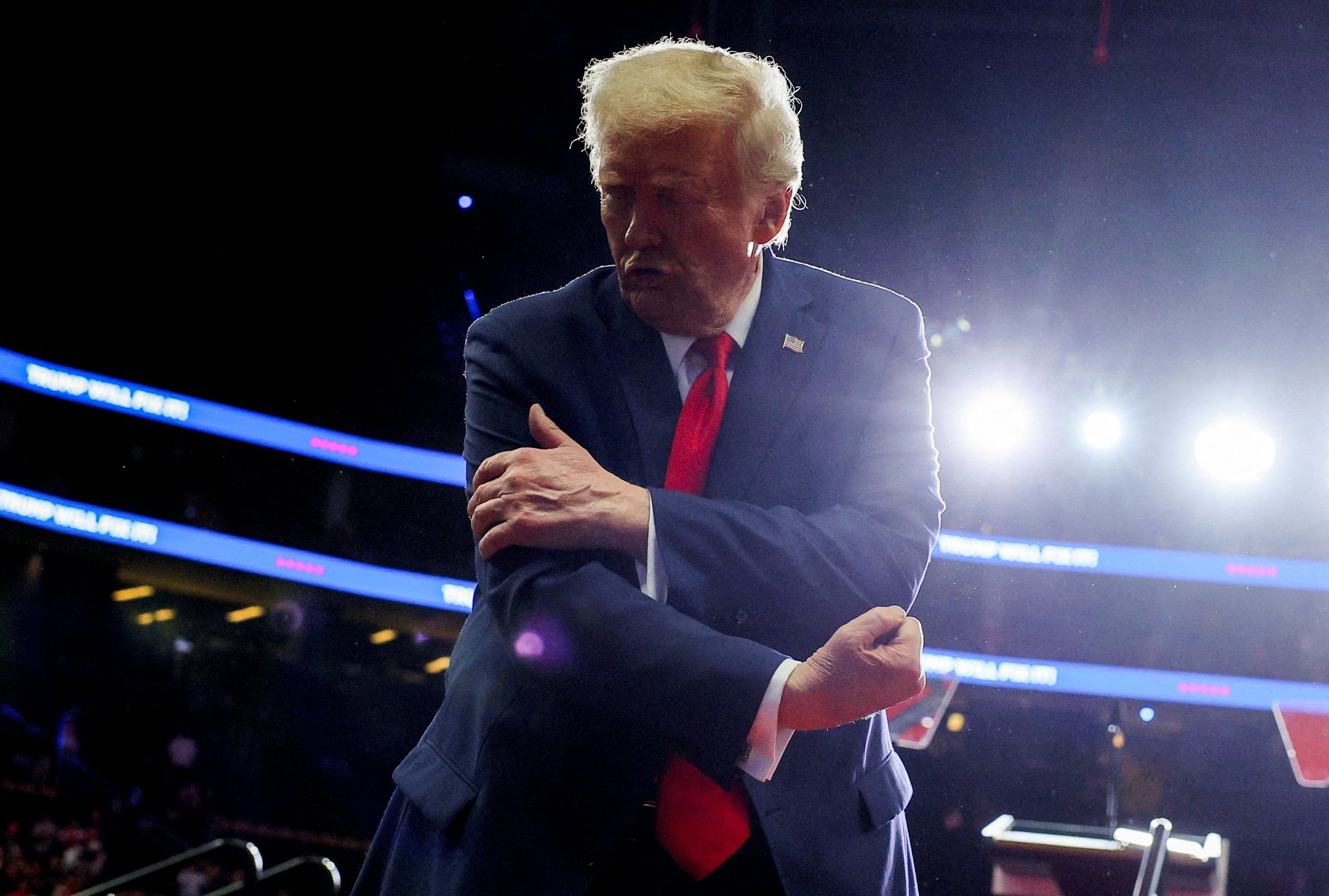 Donald Trump flexes his muscles during a campaign rally in Pittsburgh, Pennsylvania, on Monday. Photo: Reuters