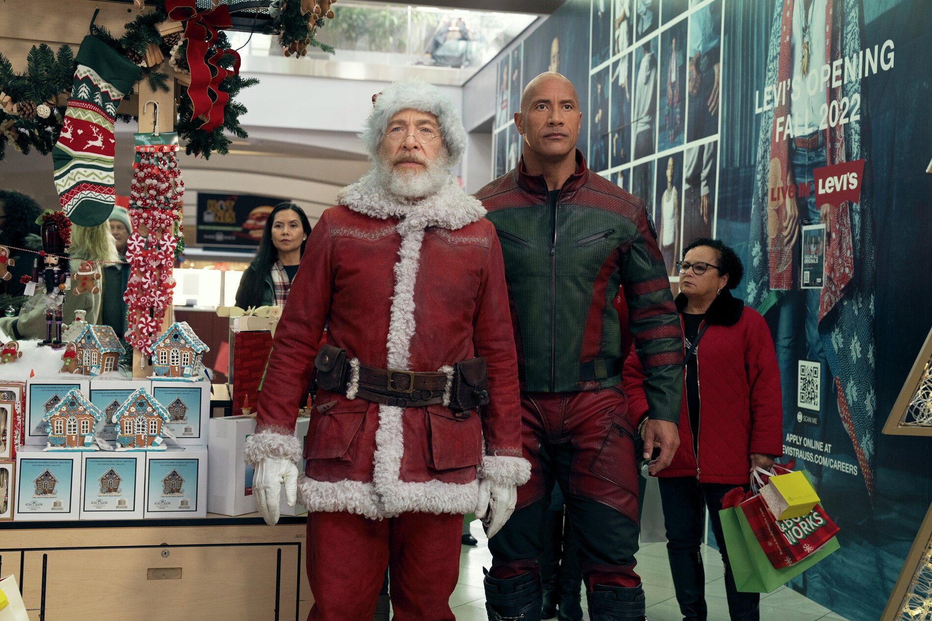 JK Simmons (left) as Santa Claus and Dwayne Johnson as Callum Drift in a still from Red One. Before you watch this new film, we have 10 other Christmas films for you. Photo: Frank Masi/Prime Video