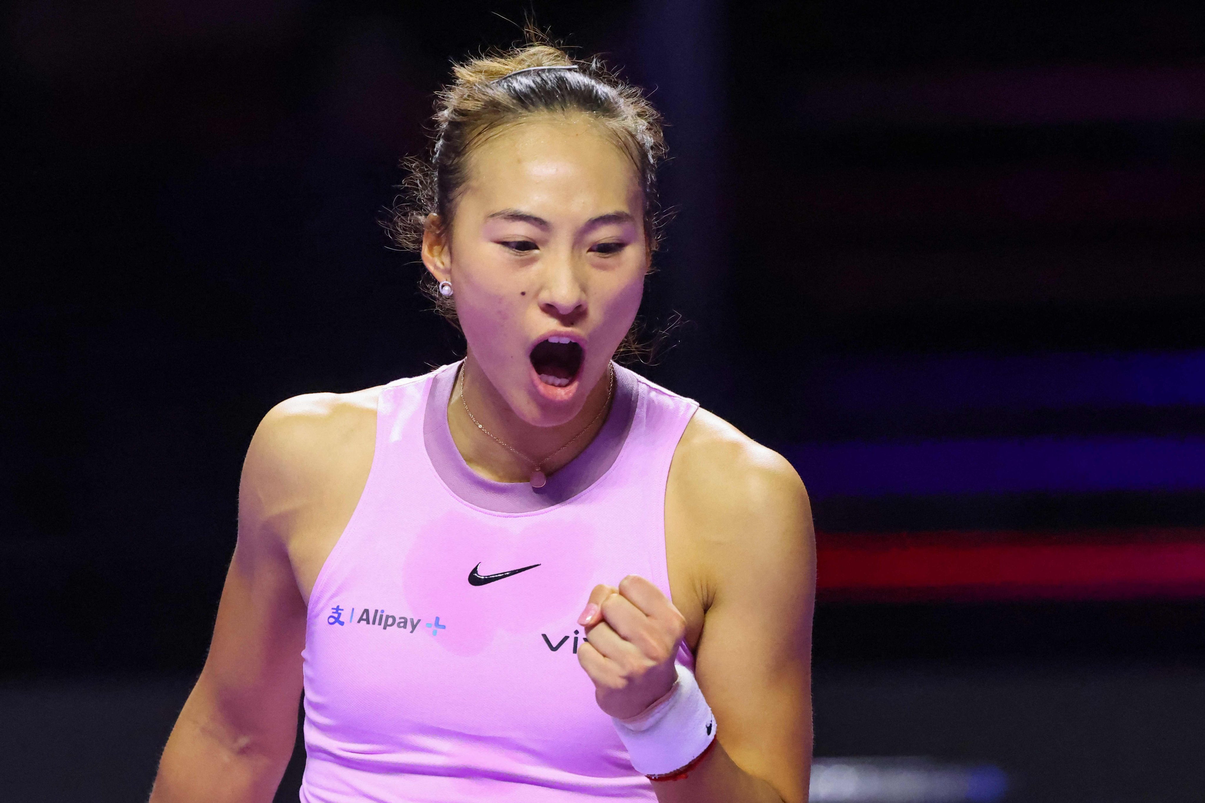 China’s Qinwen Zheng celebrates during her WTA Finals match against Elena Rybakina. Photo: AFP