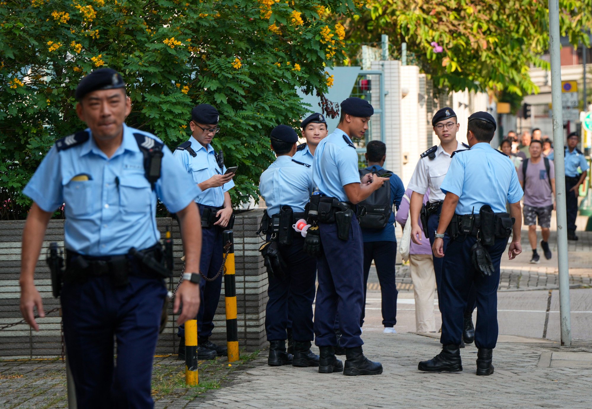 Security officers will call police if knives, saws, scissors and brass knuckles are discovered. Photo: Sam Tsang