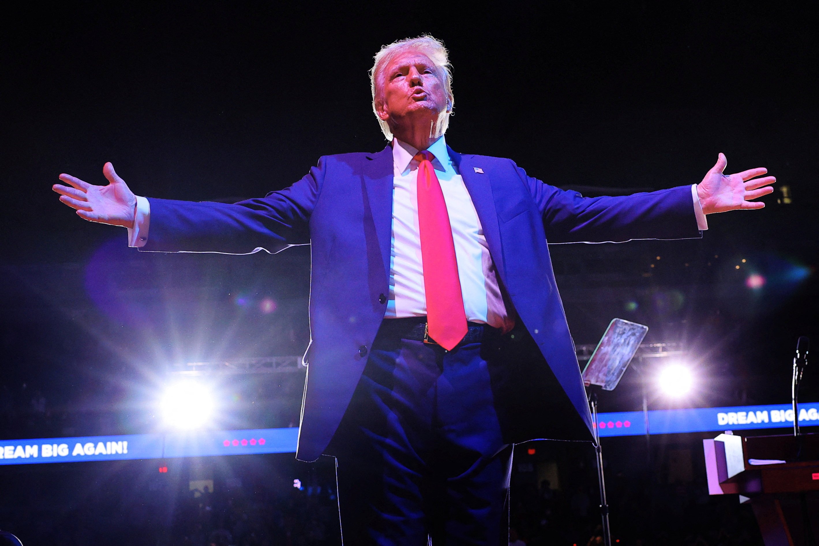 Donald Trump gestures to the crowd at the conclusion of his final rally of the campaign at Van Andel Arena in Grand Rapids, Michigan, US. Photo: Reuters