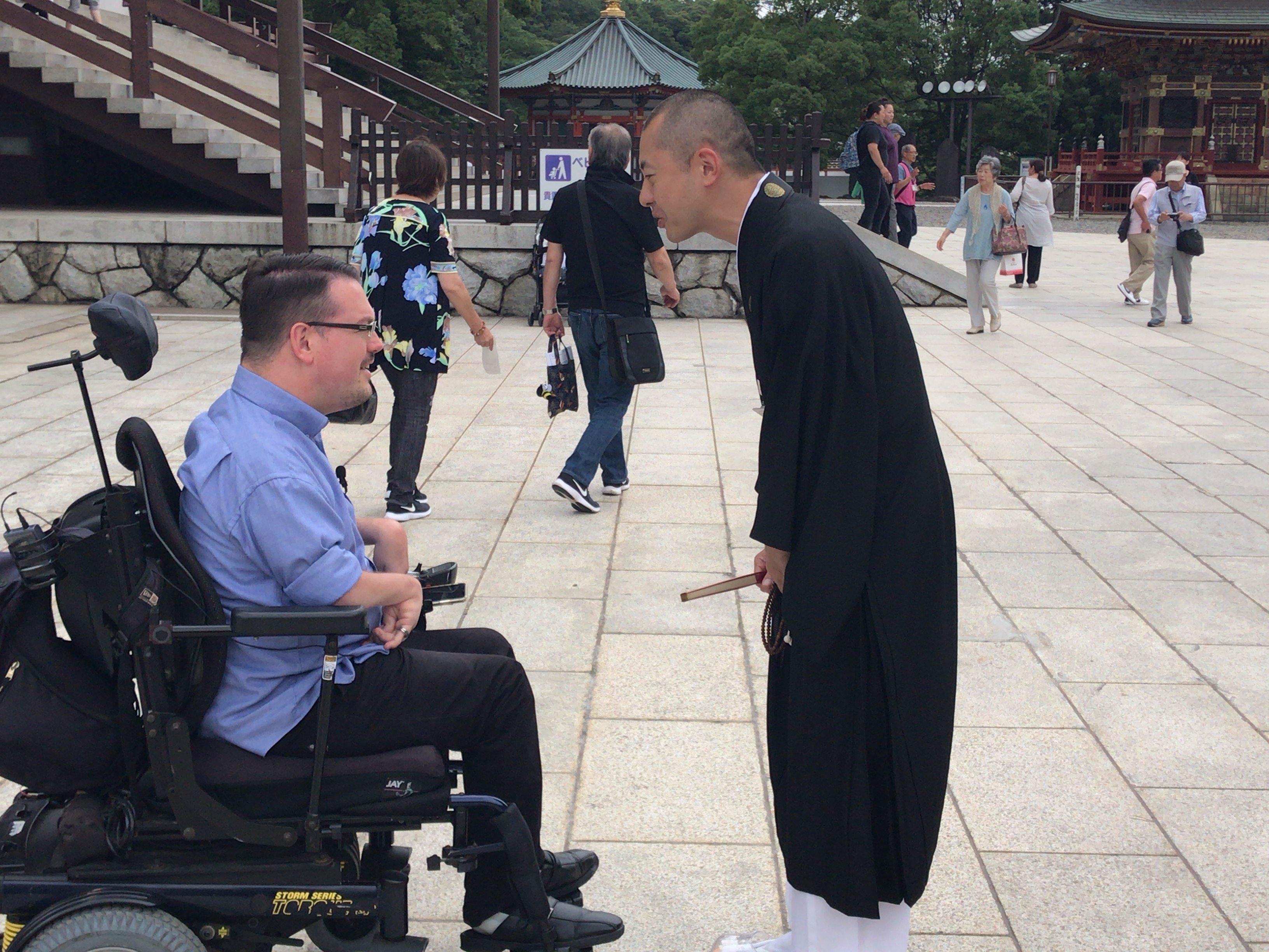 Josh Grisdale says he has received assistance everywhere he has travelled in Japan, including from this priest in Kyoto. 
Photo: Josh Grisdale