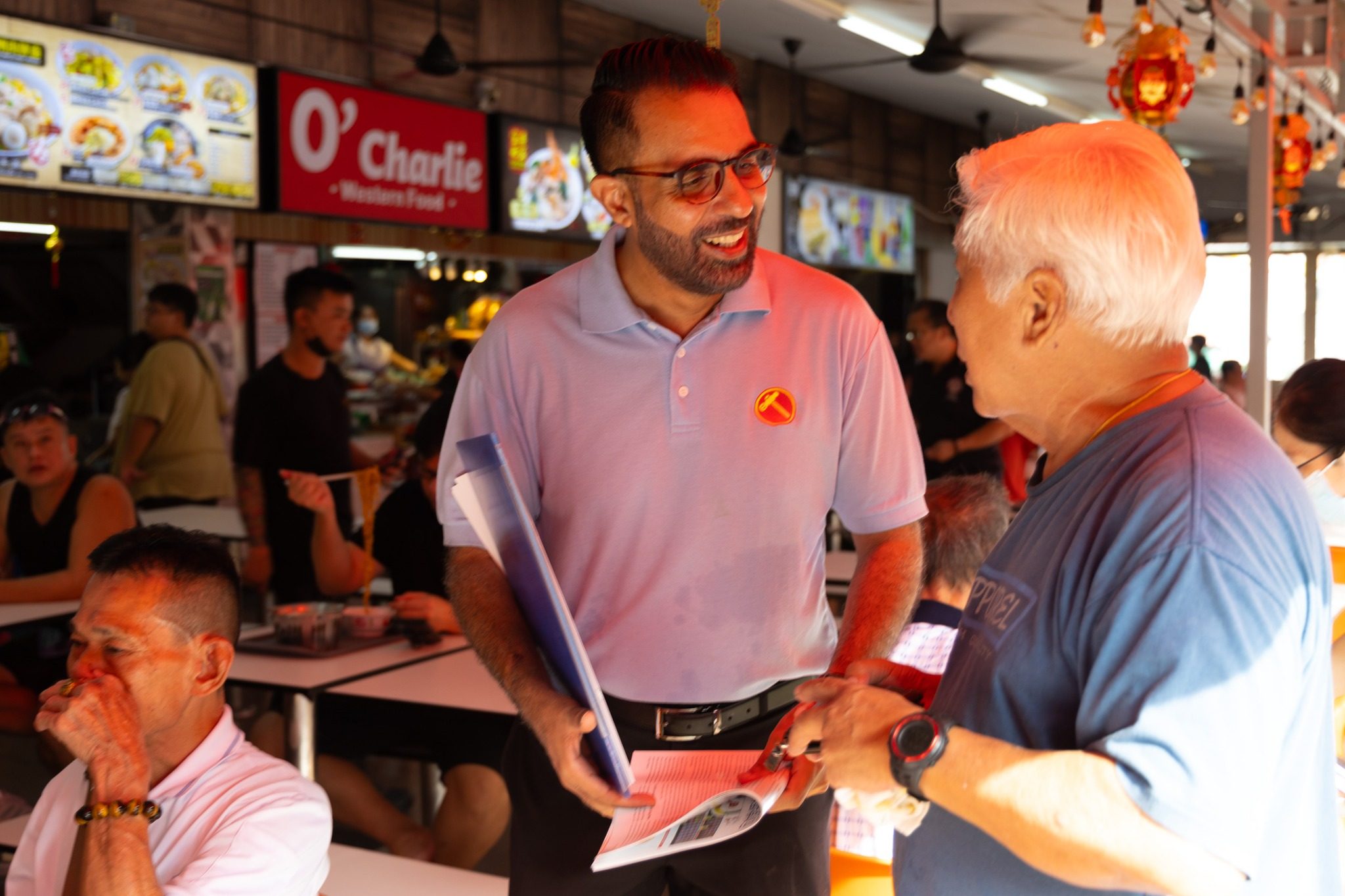 Workers’ Party chief Pritam Singh at a food centre in Singapore in June. Photo: The Workers’ Party/ Facebook