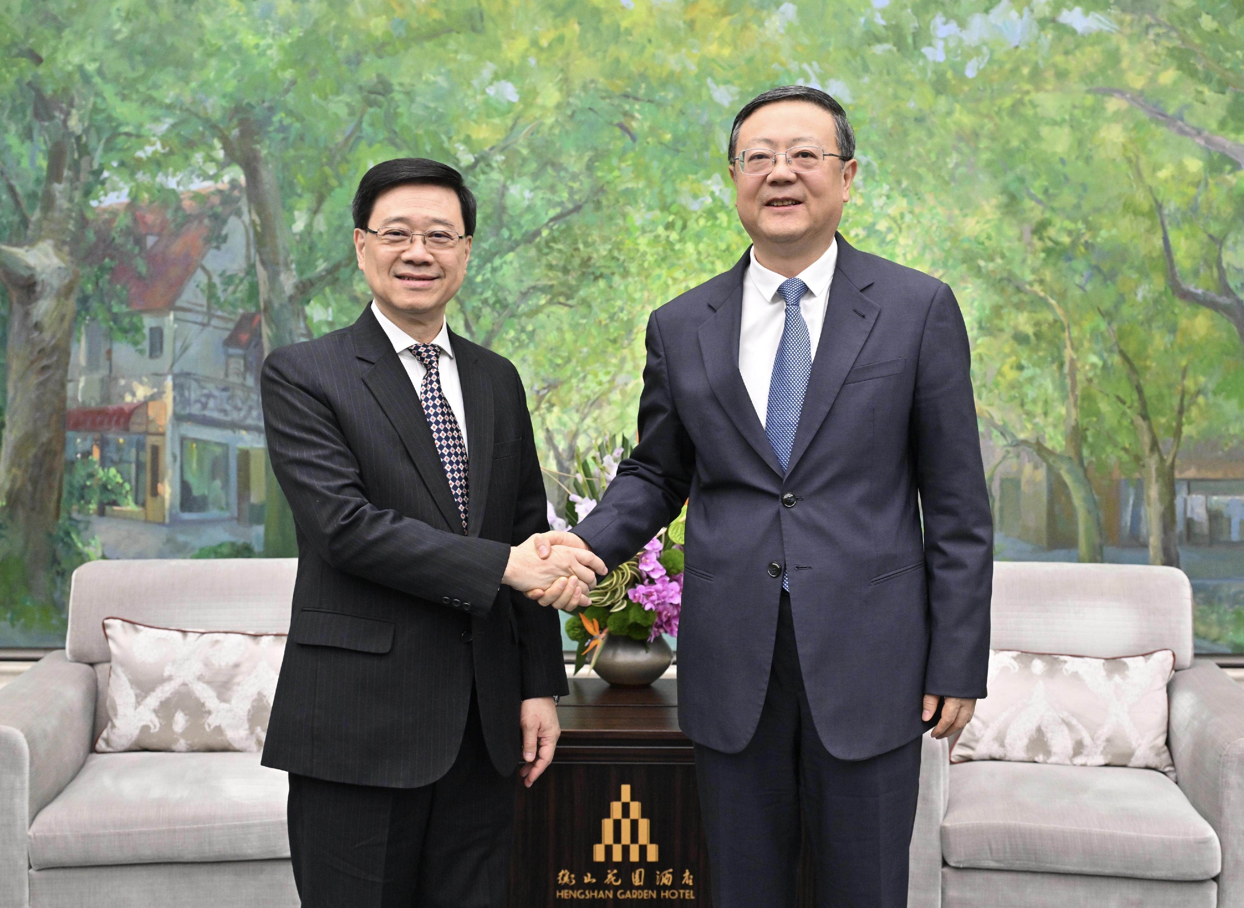 Chief Executive John Lee (left) and Shanghai party chief Chen Jining. Lee says the two places “will continue to achieve complementarity and mutual benefits”. Photo: Handout