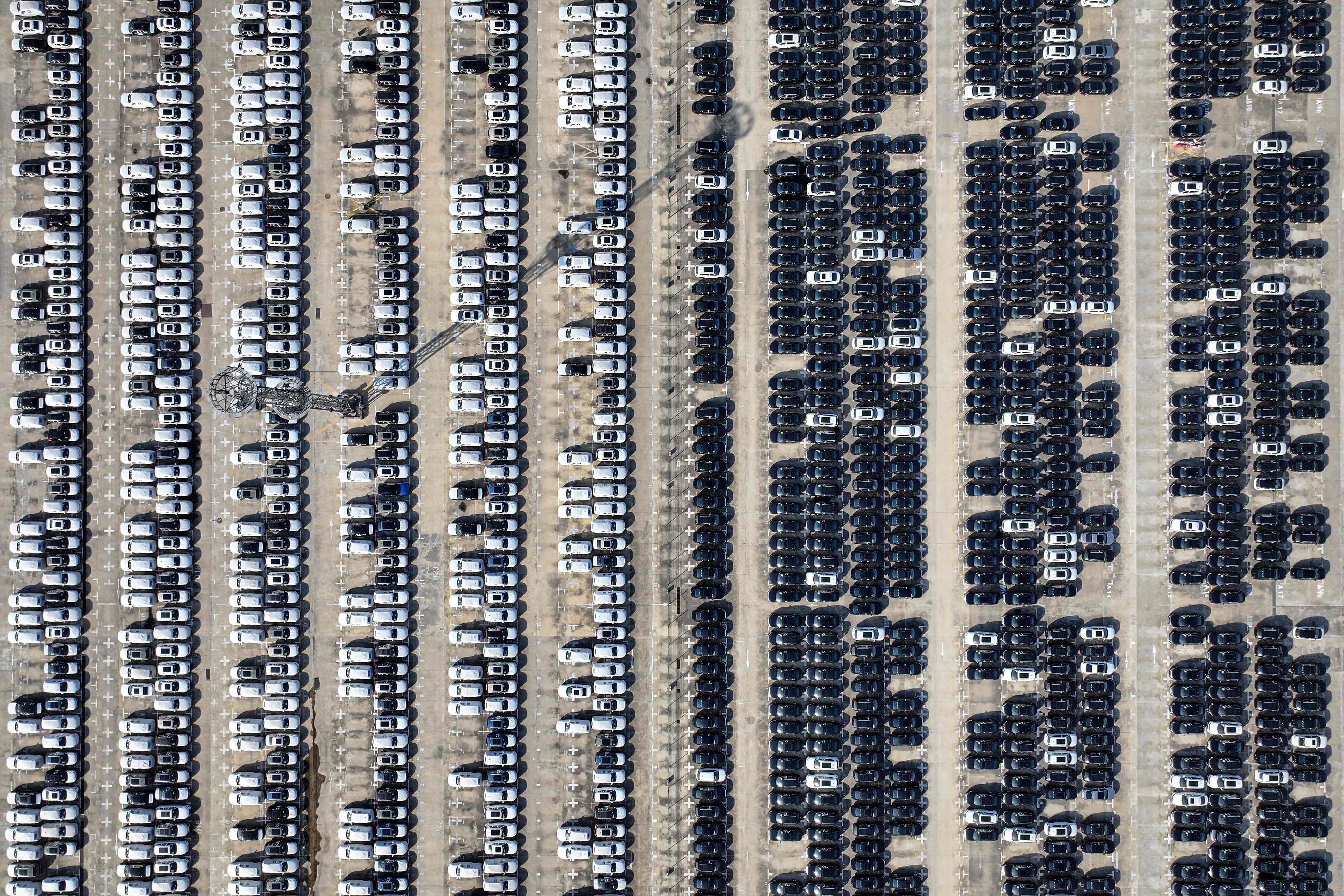 Aerial view of Volkswagen cars to be loaded onto a ship at a port in Nanjing, in eastern China’s Jiangsu province. Photo: AFP