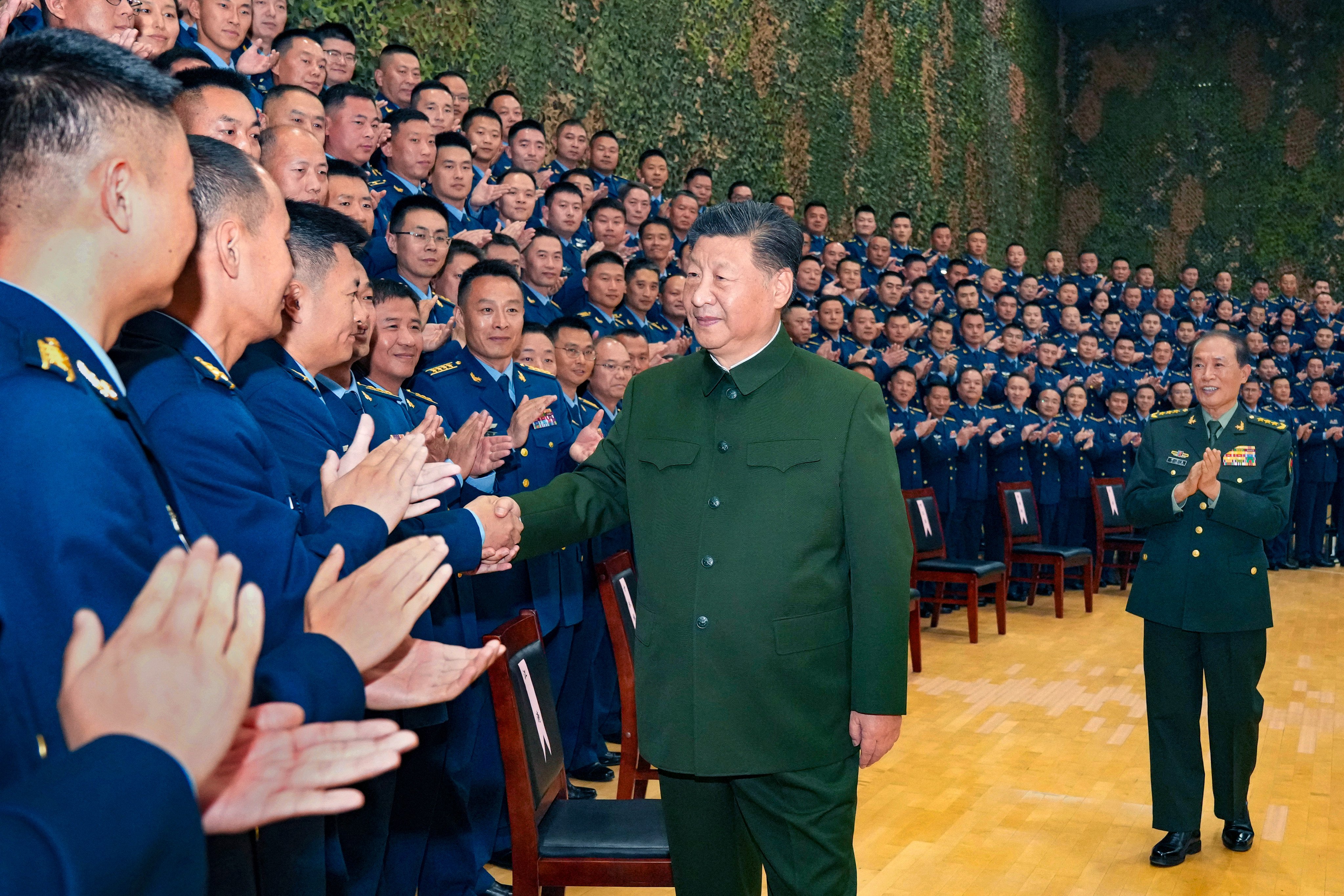 President Xi Jinping meets officers and soldiers at the PLA Air Force Airborne Corps in Xiaogan, Hubei province on Monday. Photo: Xinhua
