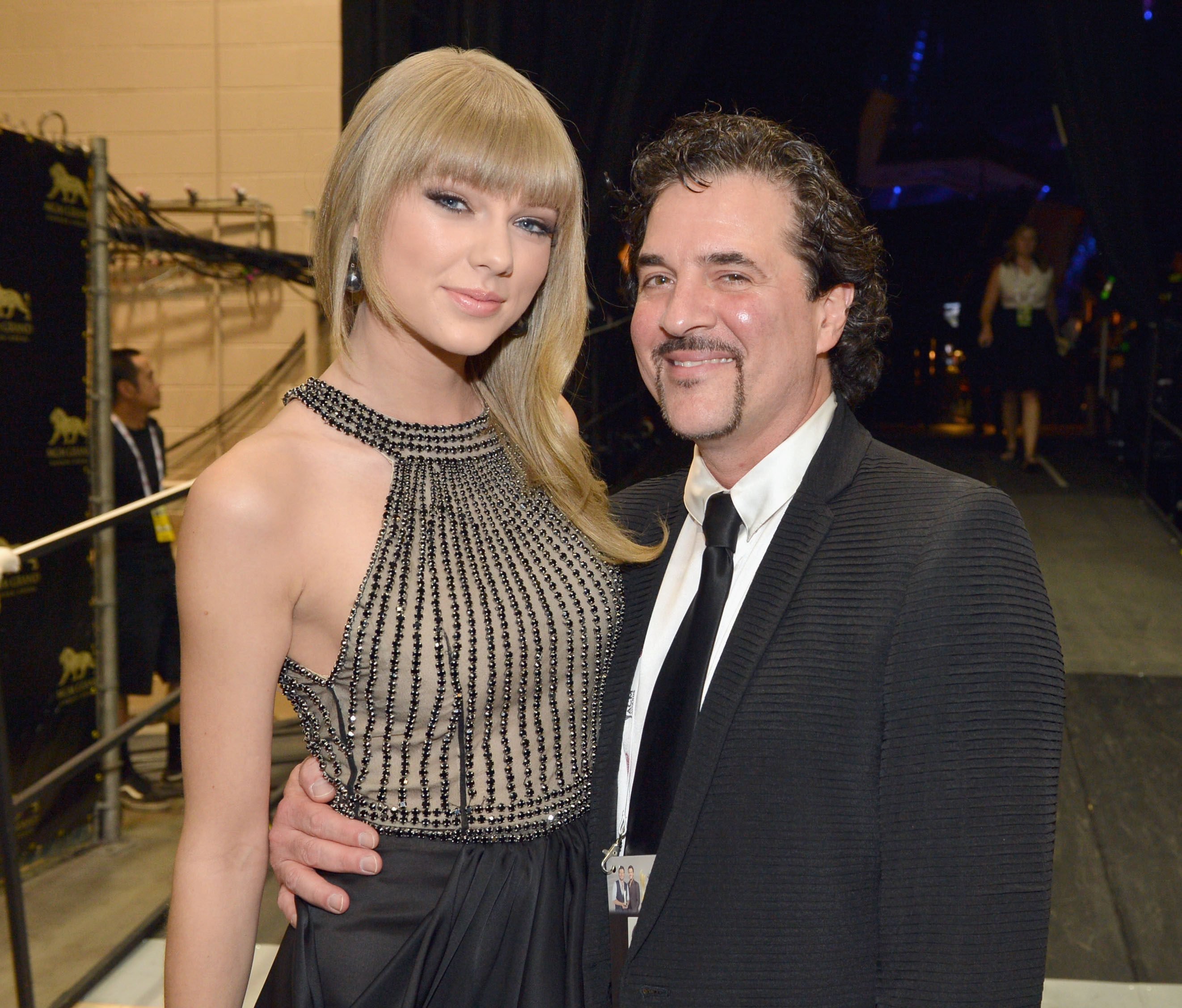 Singer Taylor Swift and Big Machine Records founder Scott Borchetta at the 48th Annual Academy of Country Music Awards at the MGM Grand Garden Arena in 2013, in Las Vegas, Nevada. Photo: Getty Images