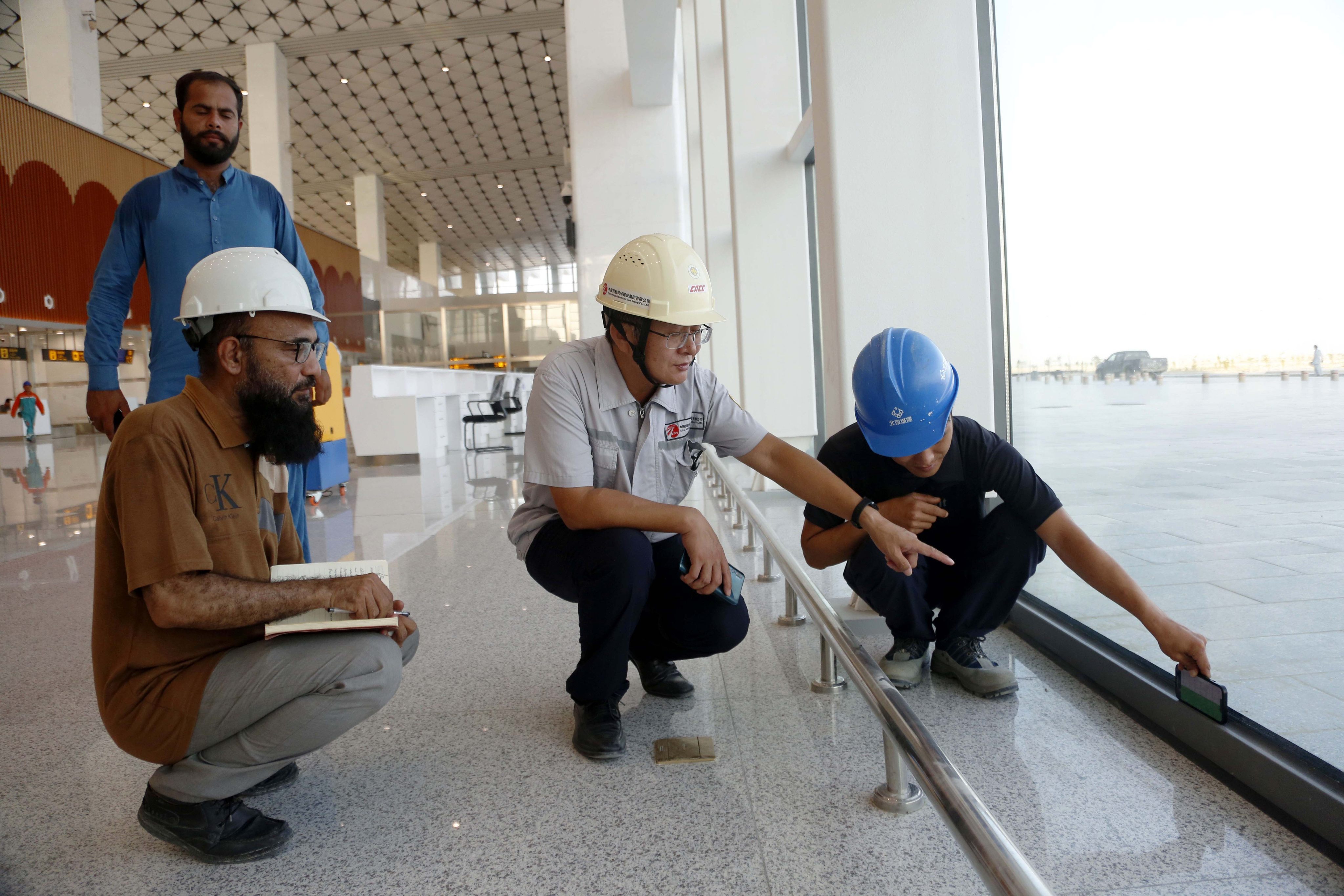 Chinese and Pakistani engineers conduct an inspection at the New Gwadar International Airport in Gwadar, Pakistan, on September 14. Photo: Xinhua