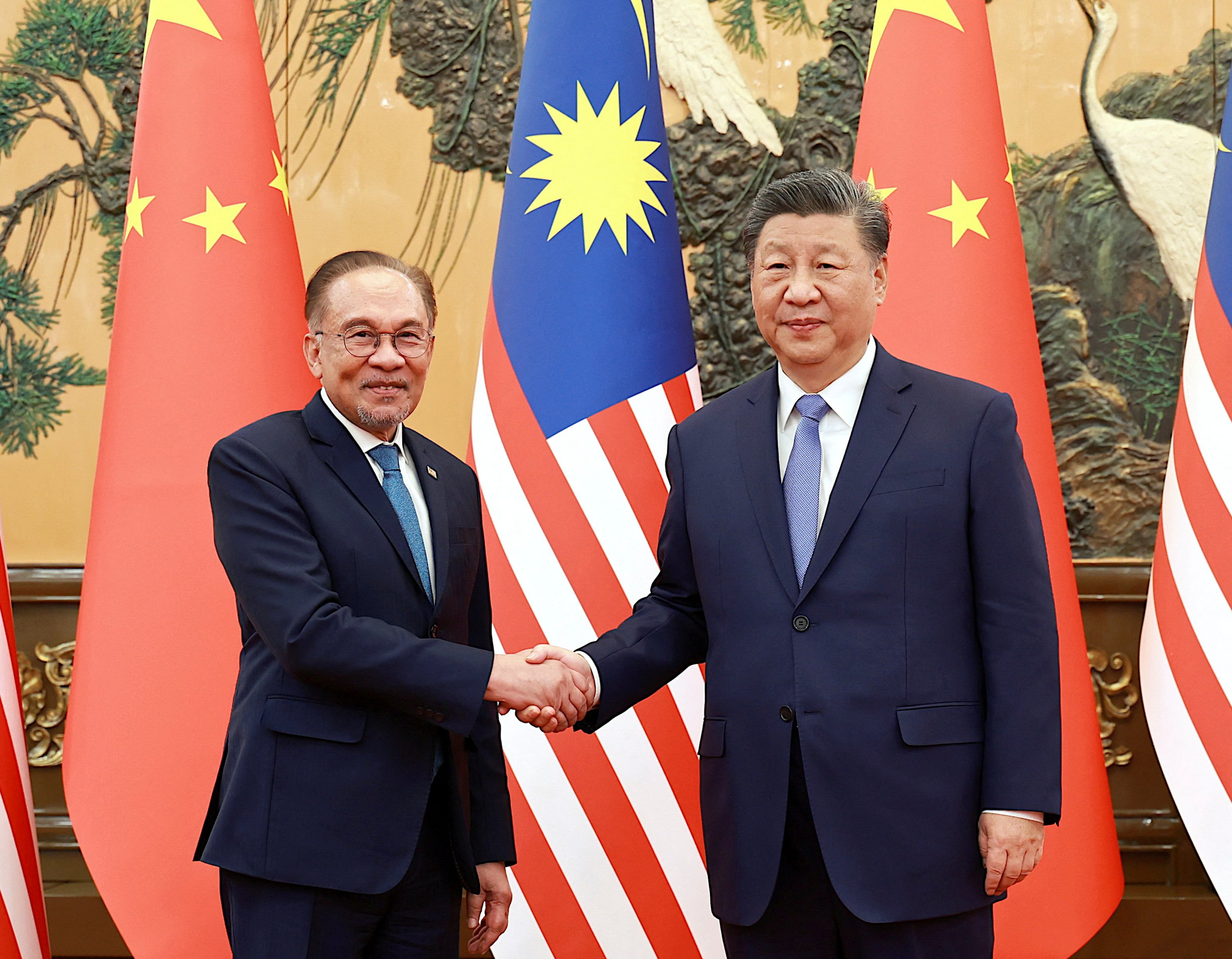 Chinese President Xi Jinping with Malaysian Prime Minister Anwar Ibrahim in Beijing on Thursday. Photo: via Reuters