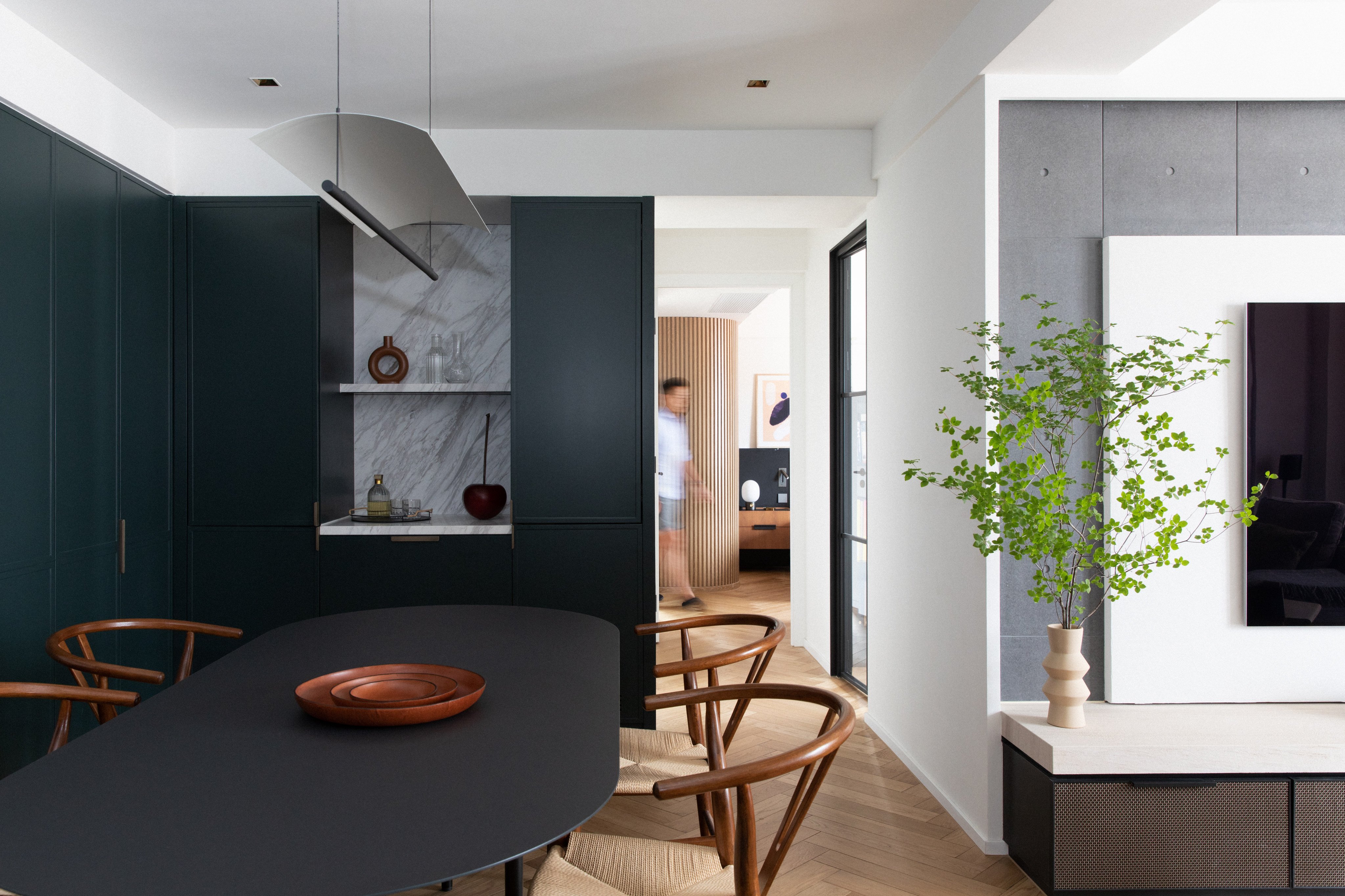 The sleek dining area of this Wan Chai, Hong Kong bachelor pad. Photo: Harold de Puymorin