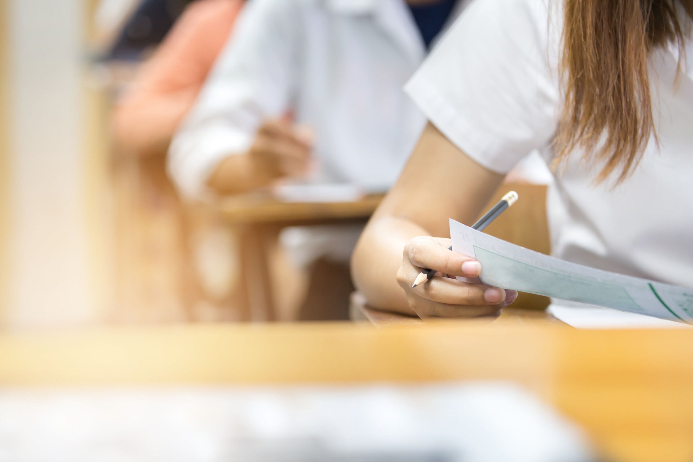 Cambridge International Education has announced that all its exams will switch from paper to digital from June 2026 with marking done by AI and an early adopter programme to bring countries up to speed. Photo: Shutterstock