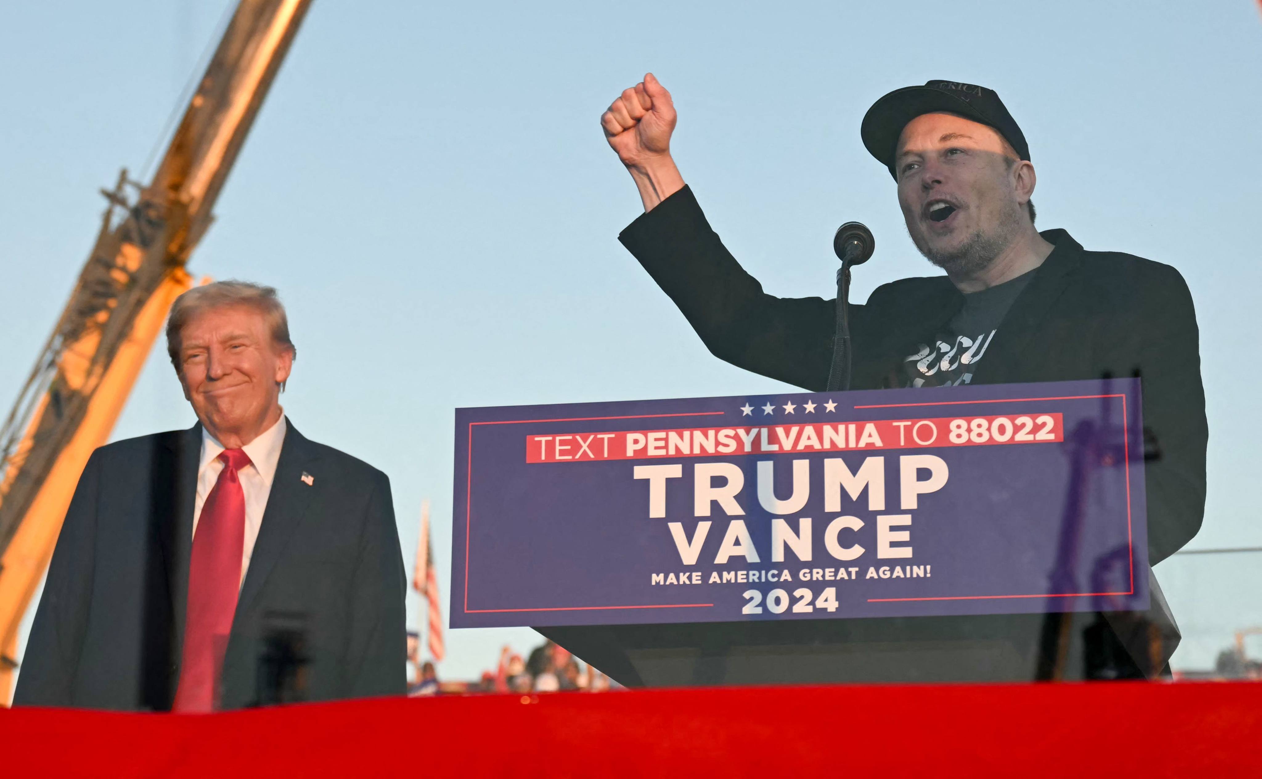 Tesla CEO Elon Musk speaks alongside Donald Trump during a campaign rally in Butler, Pennsylvania, on October 5, 2024. Photo: AFP