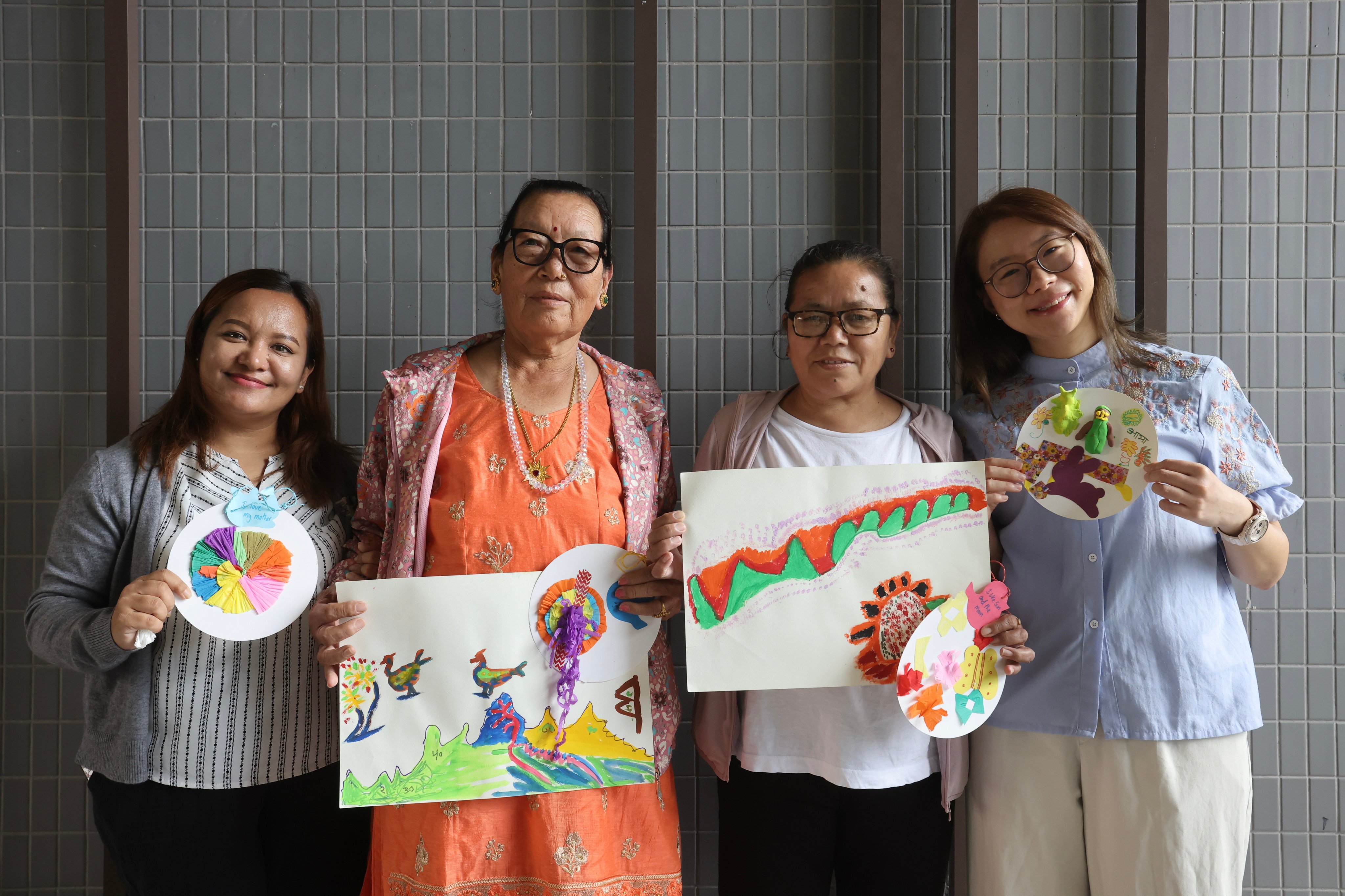 (L to R) Yuen Long Town Hall Programme Officer Madhavi Gurung, Ash Maya Limbu, Bhanu Gurung, and Hong Kong Expressive Arts Therapy Service Centre Service Director Janet Li Wai-chong. Photo: Jonathan Wong