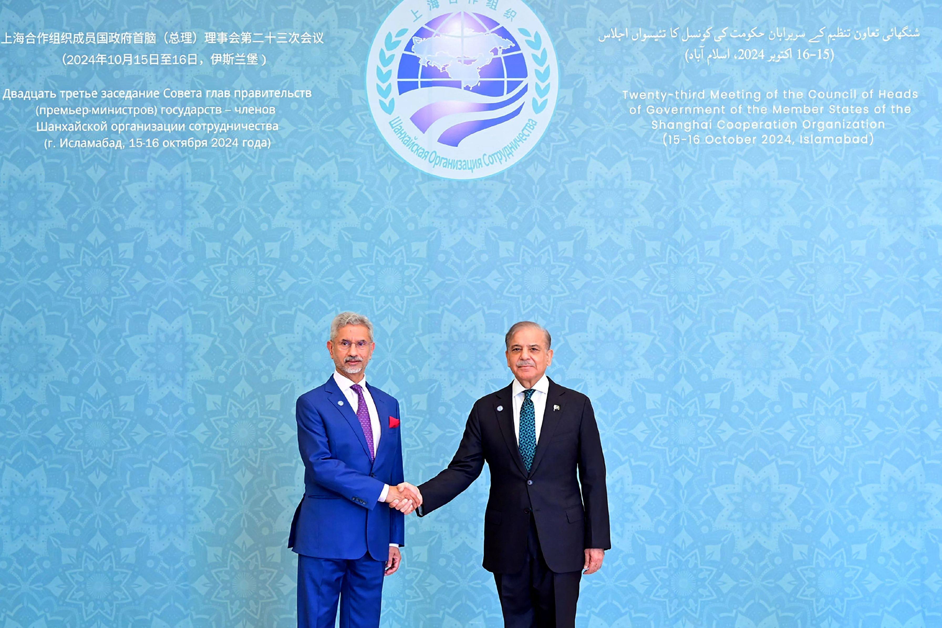 Pakistan’s Prime Minister Shehbaz Sharif (right) shakes hands with India’s Foreign Minister Subrahmanyam Jaishankar during the Shanghai Cooperation Organisation summit in Islamabad last month. Photo: Pakistan’s Press Information Department / AFP